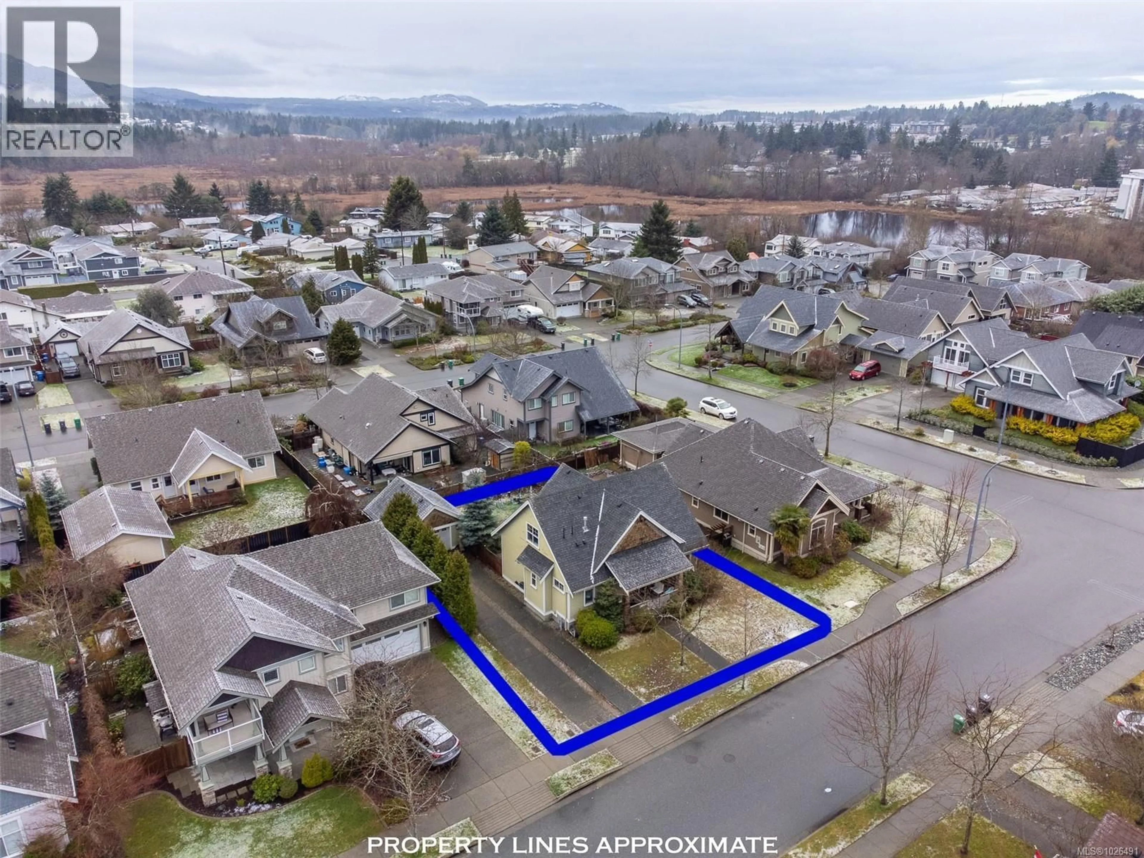 A pic from outside/outdoor area/front of a property/back of a property/a pic from drone, street for 591 SARUM RISE WAY, Nanaimo British Columbia V9T2S5