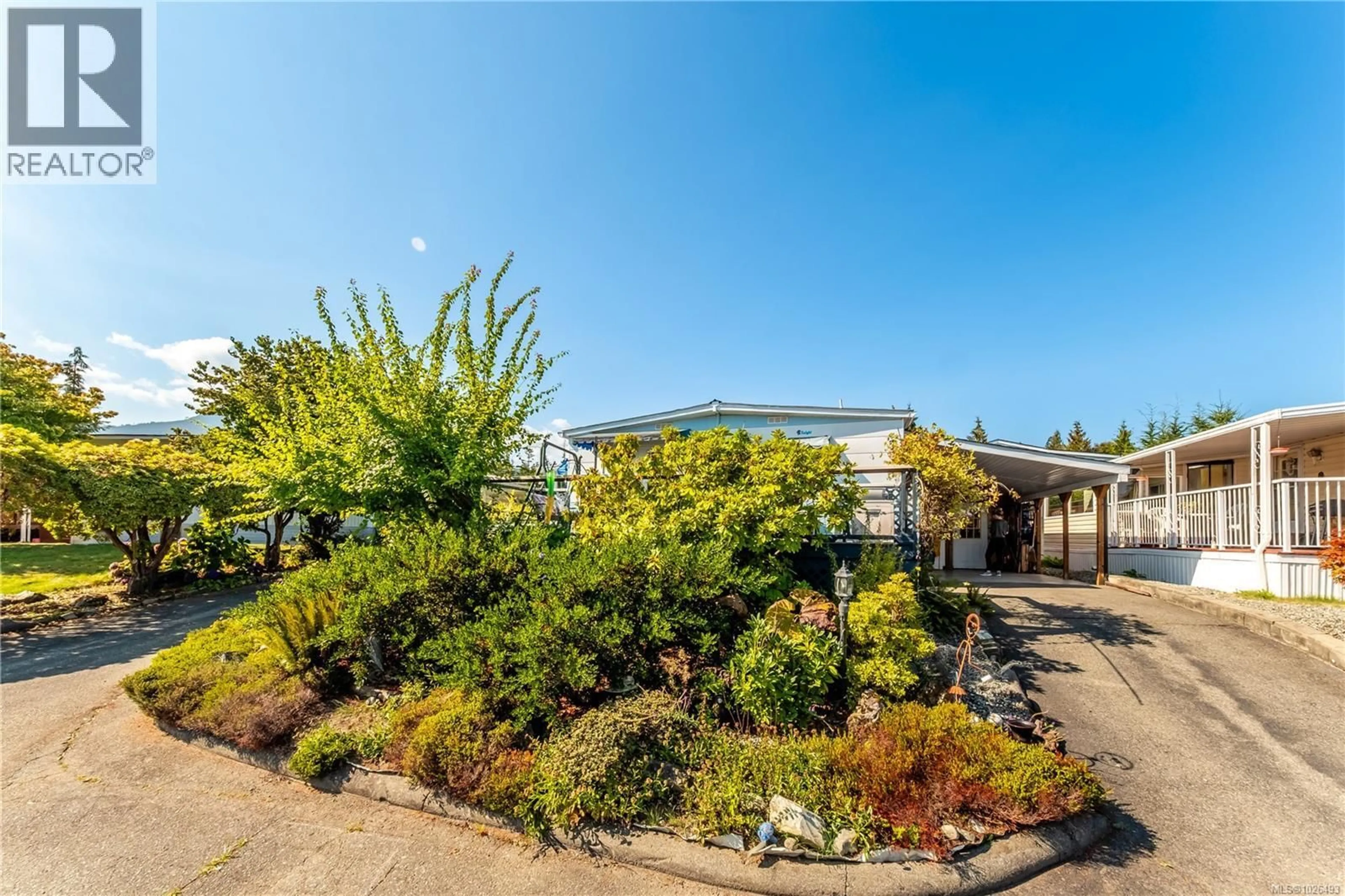 A pic from outside/outdoor area/front of a property/back of a property/a pic from drone, street for 7 - 10980 WESTDOWNE ROAD, Ladysmith British Columbia V9G1X2