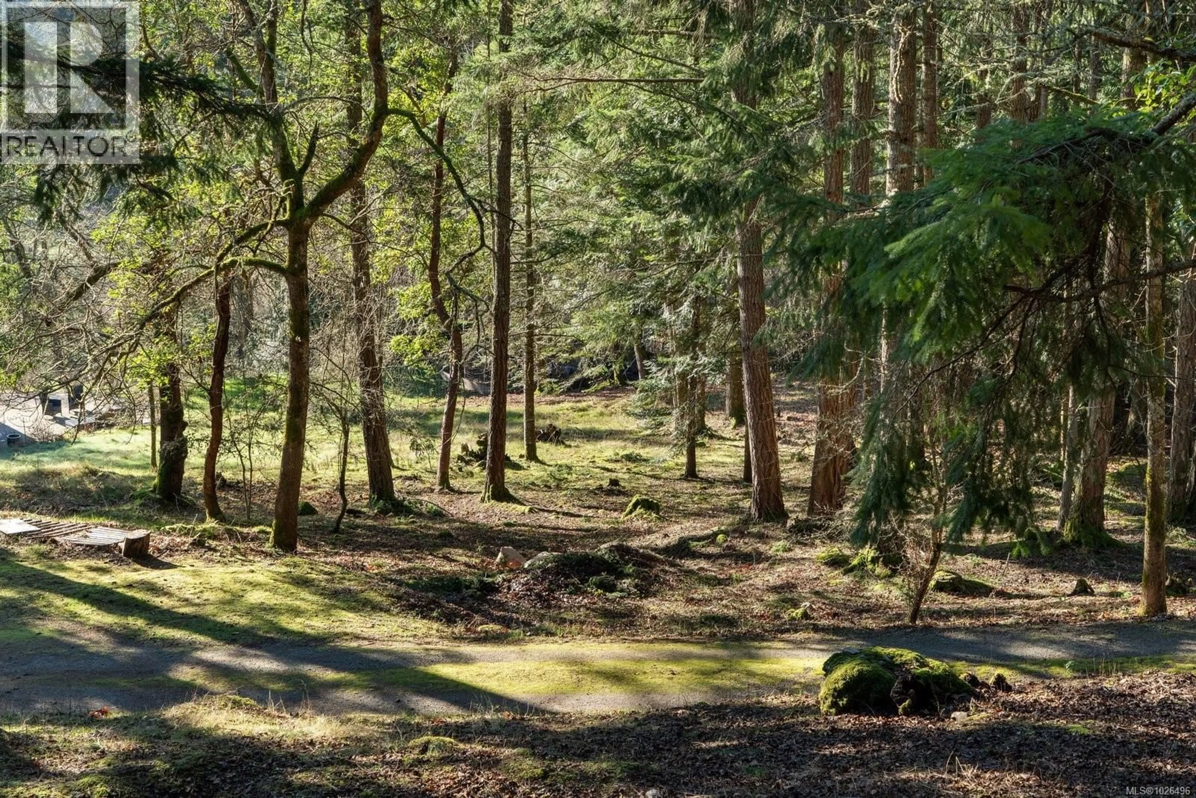 A pic from outside/outdoor area/front of a property/back of a property/a pic from drone, forest/trees view for 1183-1193 HILLGROVE ROAD, North Saanich British Columbia V8L5R8