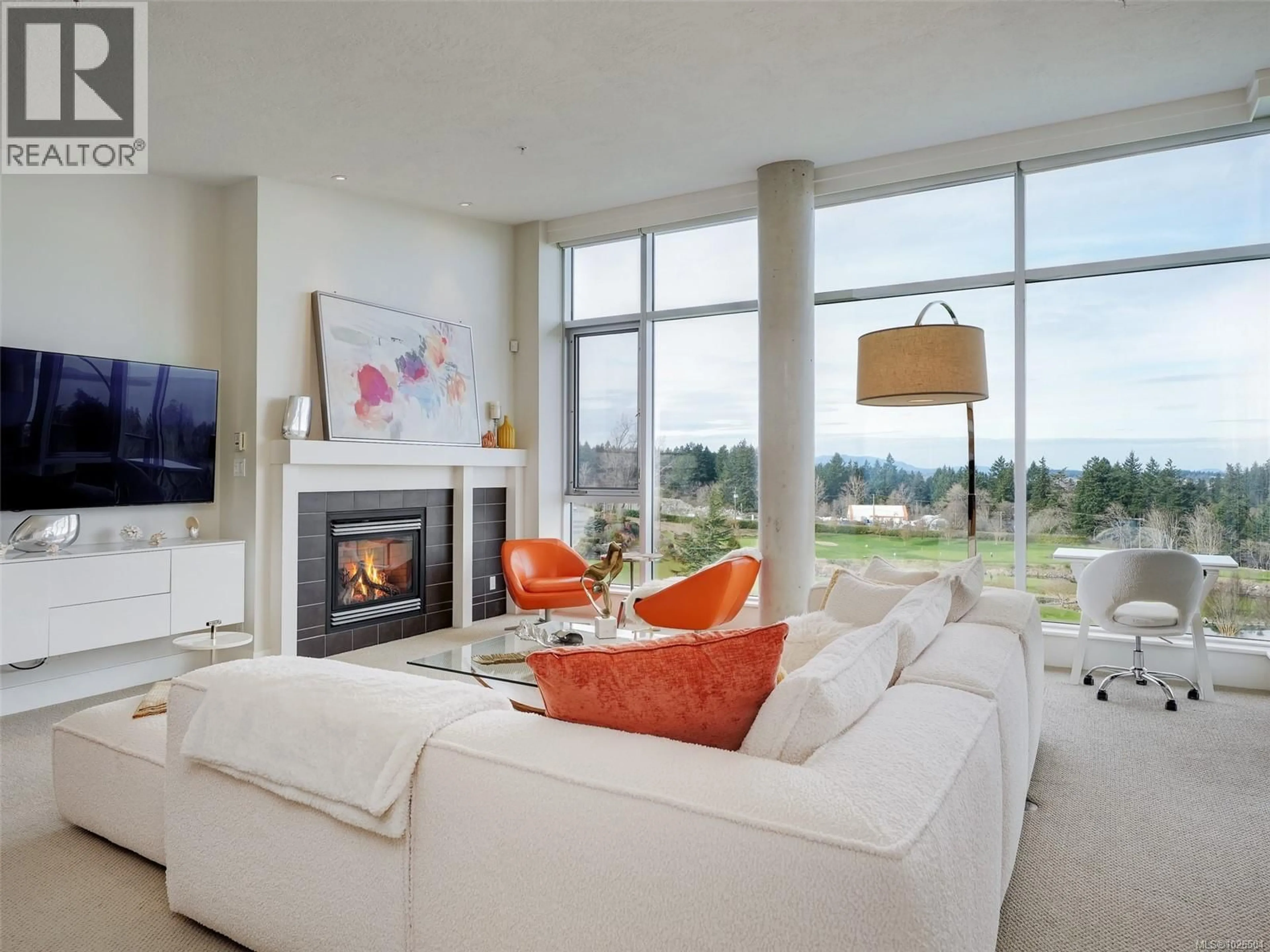 Living room with furniture, unknown for 604 - 5332 SAYWARD HILL CRESCENT, Saanich British Columbia V8Y3H8