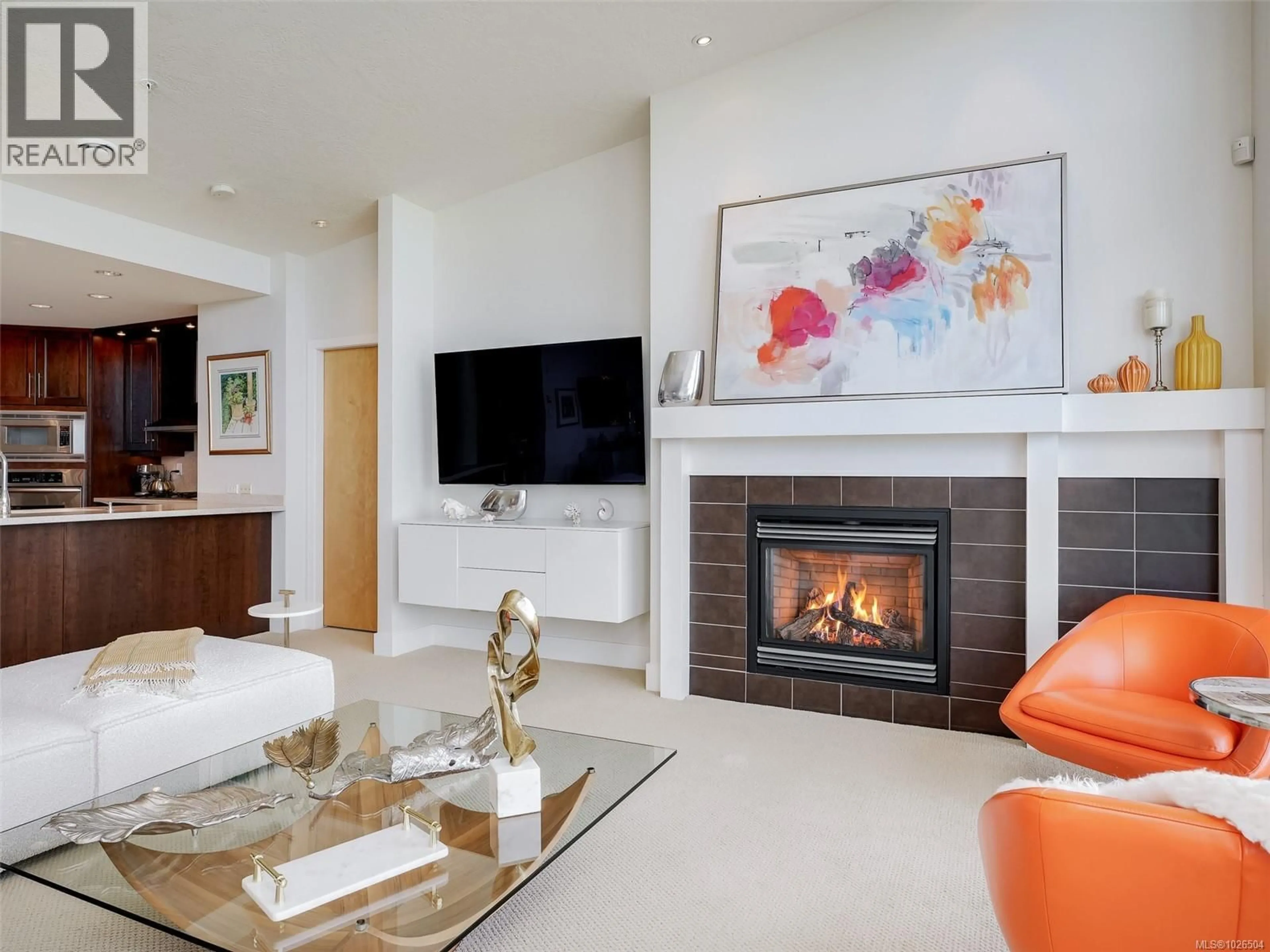 Living room with furniture, unknown for 604 - 5332 SAYWARD HILL CRESCENT, Saanich British Columbia V8Y3H8