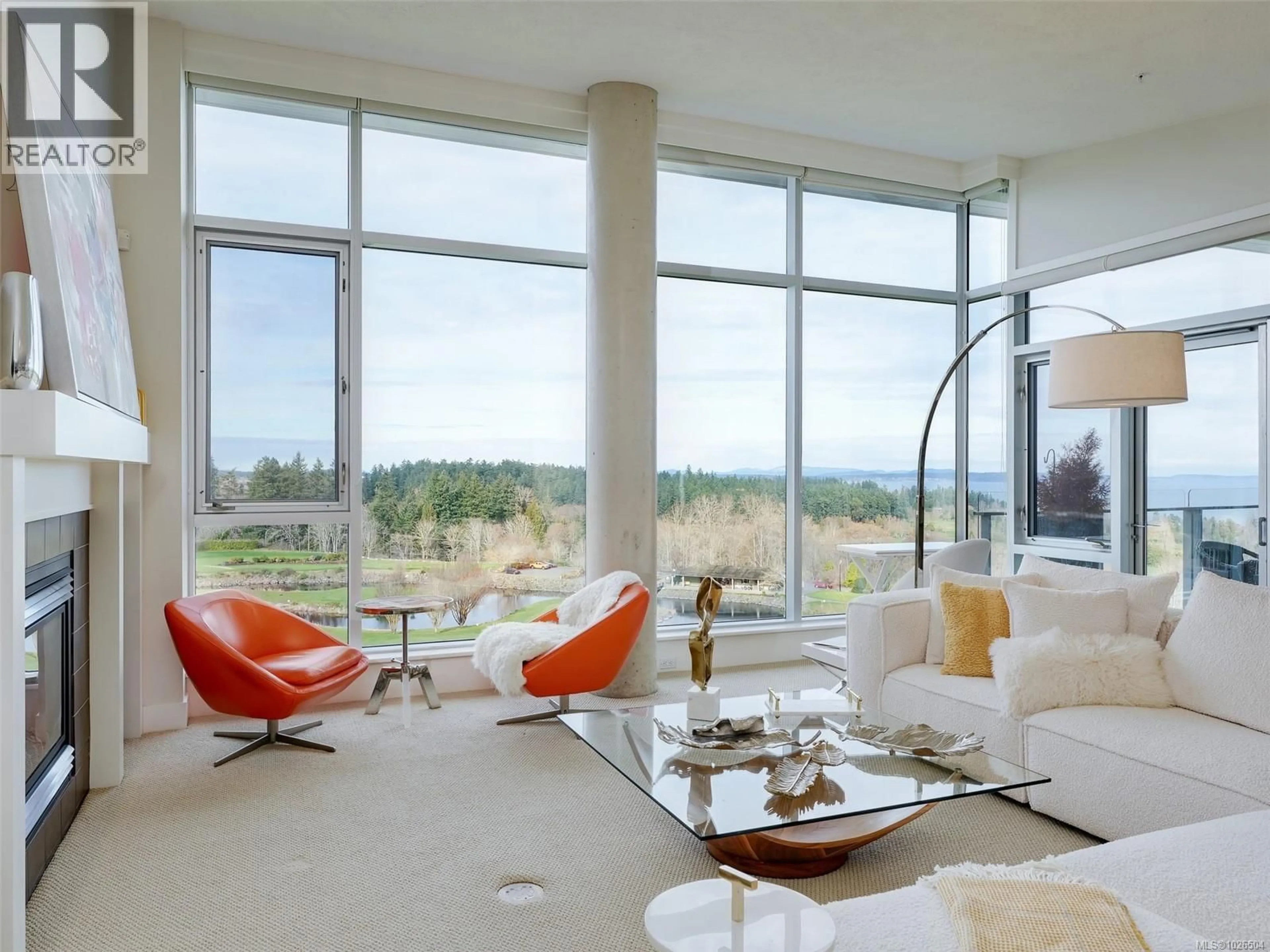 Living room with furniture, unknown for 604 - 5332 SAYWARD HILL CRESCENT, Saanich British Columbia V8Y3H8