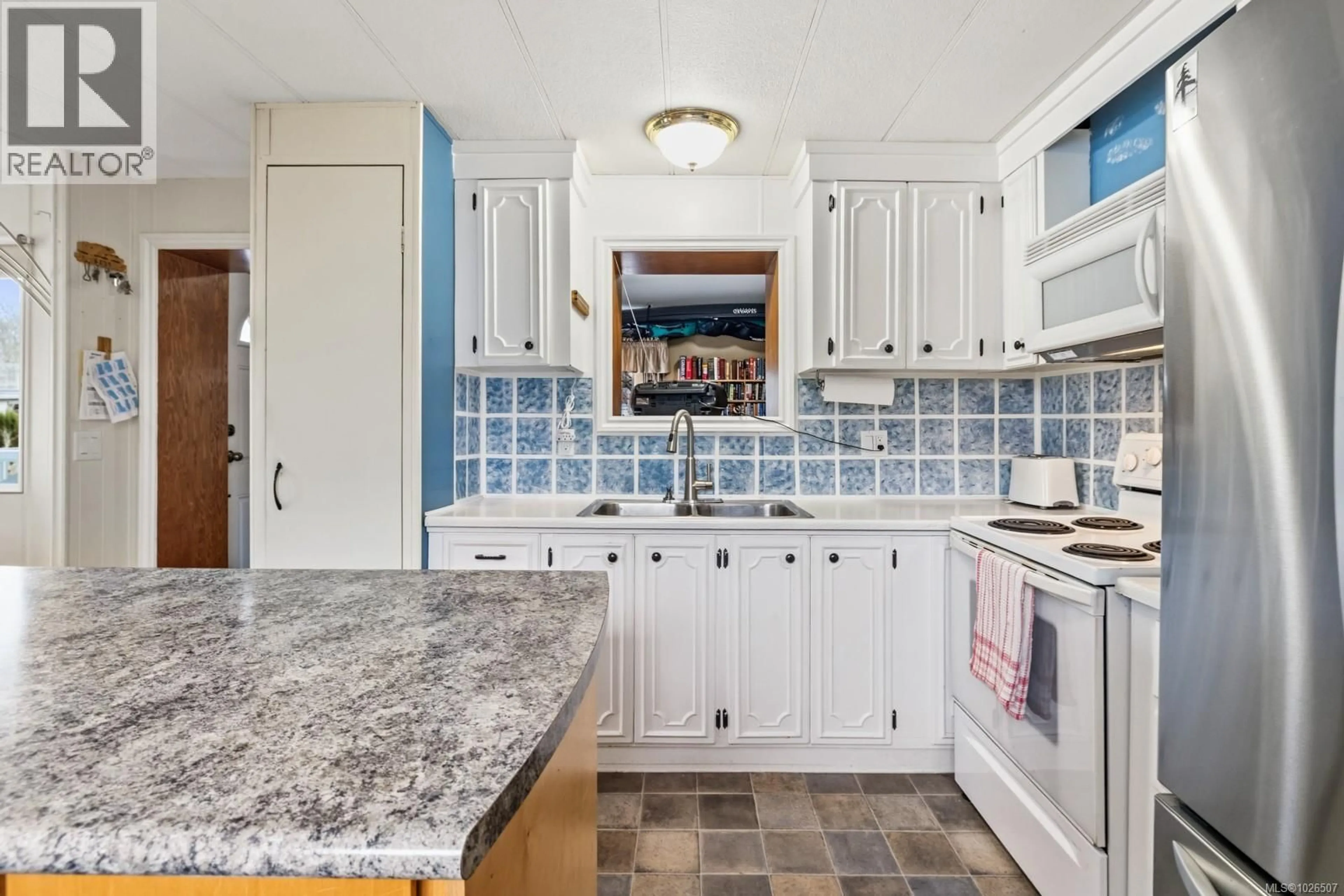 Standard kitchen, ceramic/tile floor for 241 - 2885 BOYS ROAD, Duncan British Columbia V9L4Y9