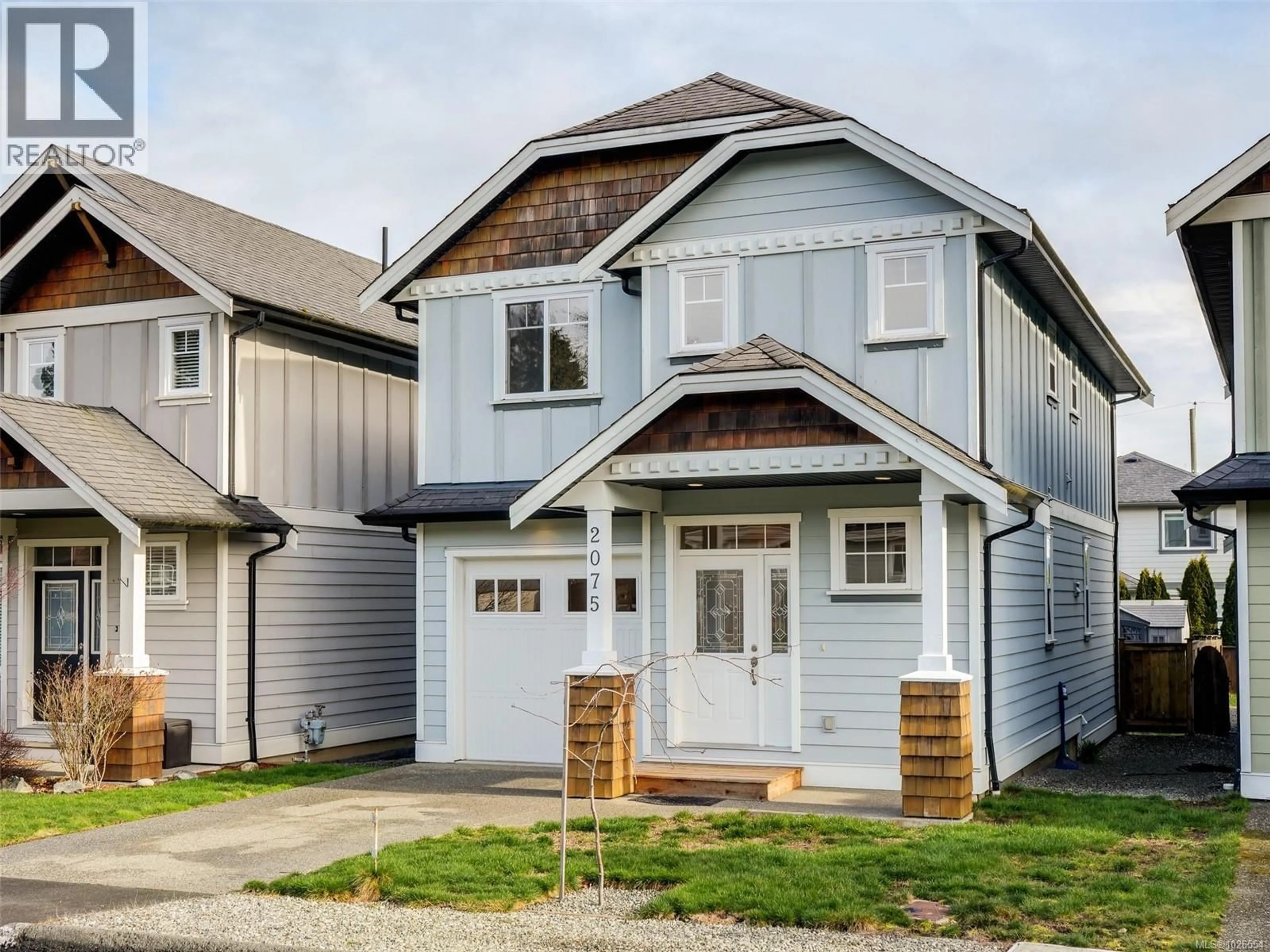 Home with vinyl exterior material, street for 2075 DOVER STREET, Sooke British Columbia V9Z1L1