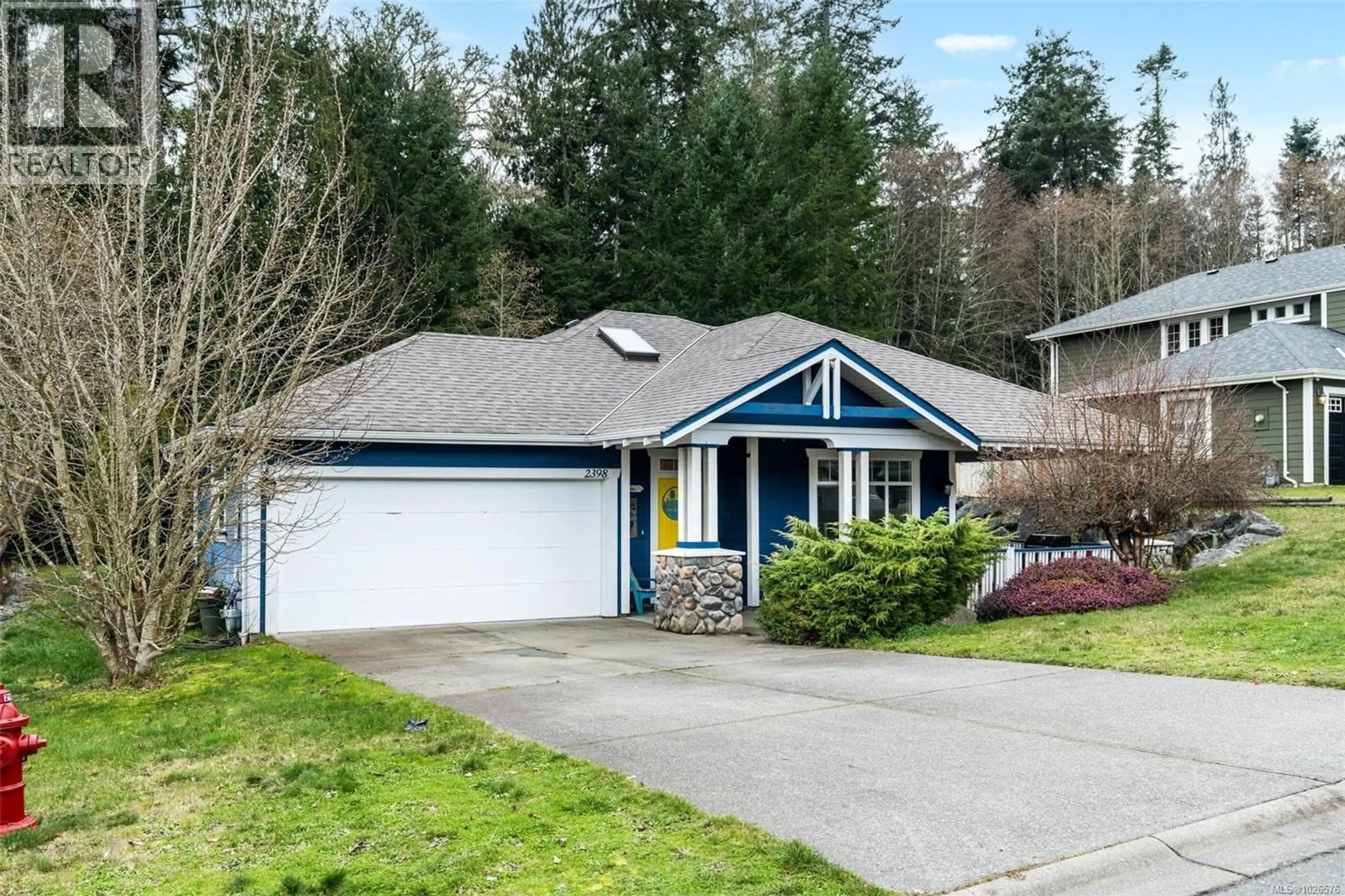 Home with vinyl exterior material, street for 2398 SUNRIVER WAY, Sooke British Columbia V9Z0Y5
