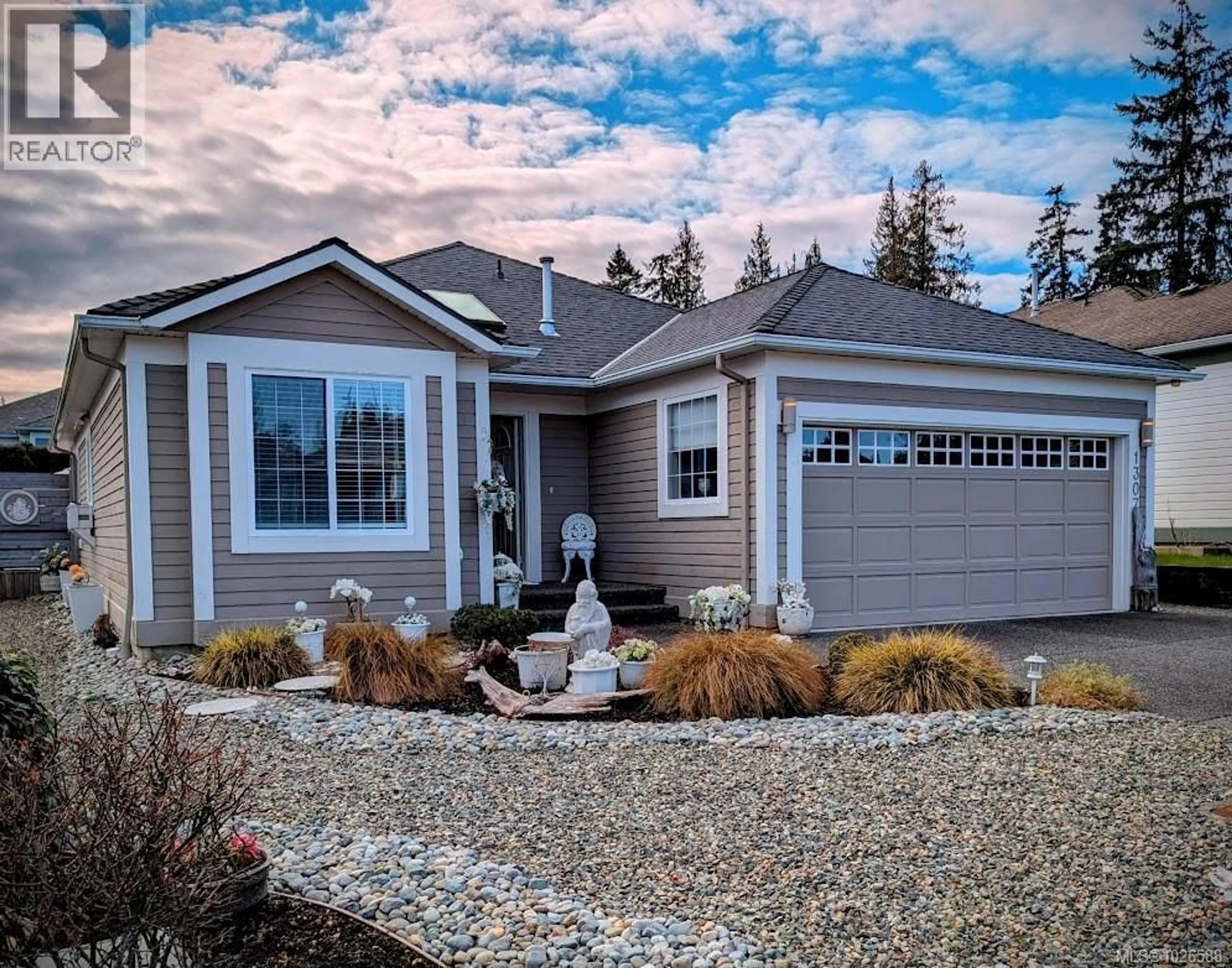 Home with vinyl exterior material, street for 1307 OCEANSIDE DRIVE, Qualicum Beach British Columbia V9K2K4