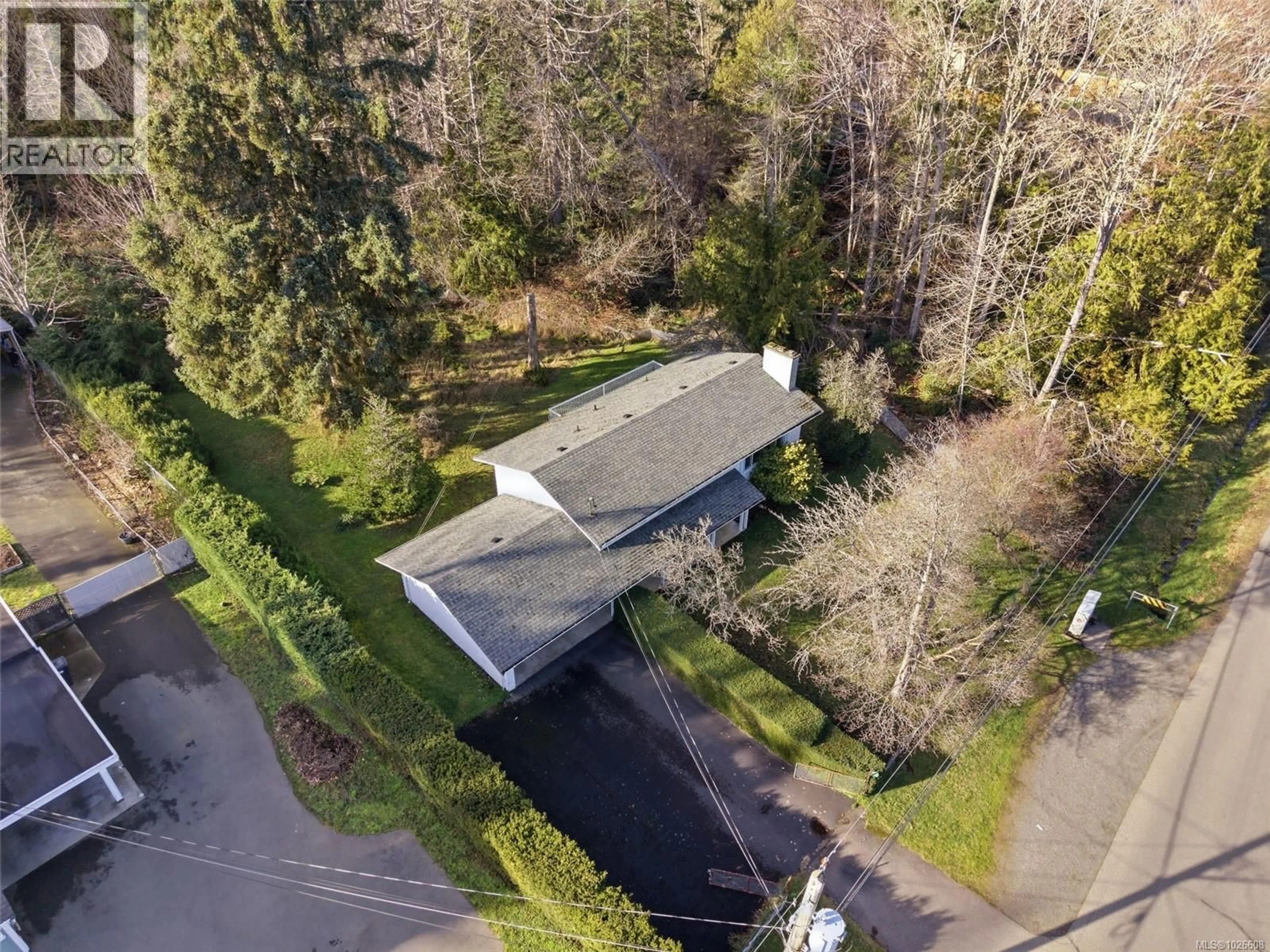 A pic from outside/outdoor area/front of a property/back of a property/a pic from drone, street for 439 CRAIG STREET, Parksville British Columbia V9P1L2