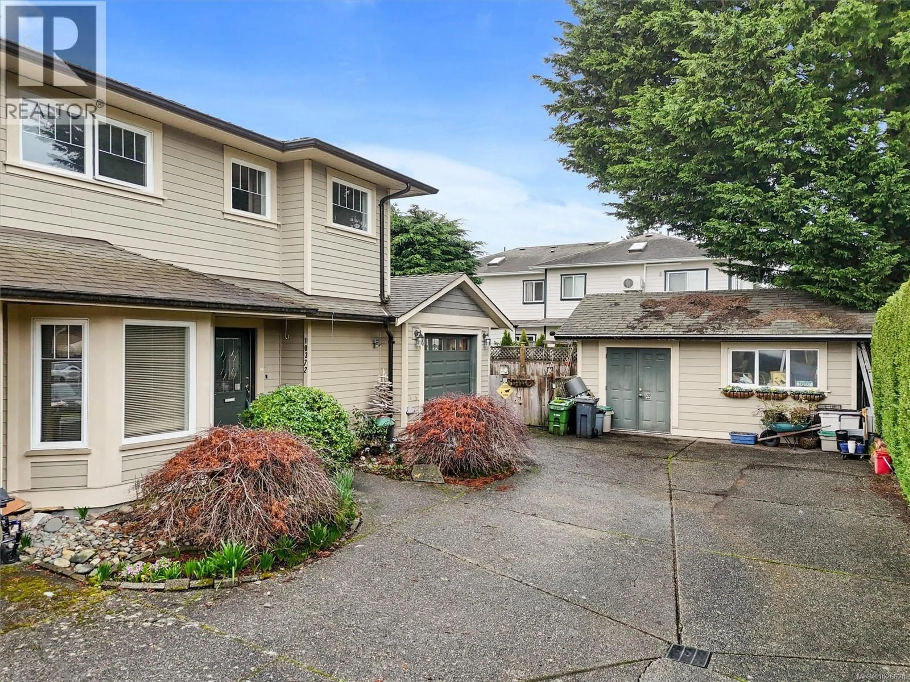 A pic from outside/outdoor area/front of a property/back of a property/a pic from drone, street for 10372 BOWERBANK ROAD, Sidney British Columbia V8L3L7