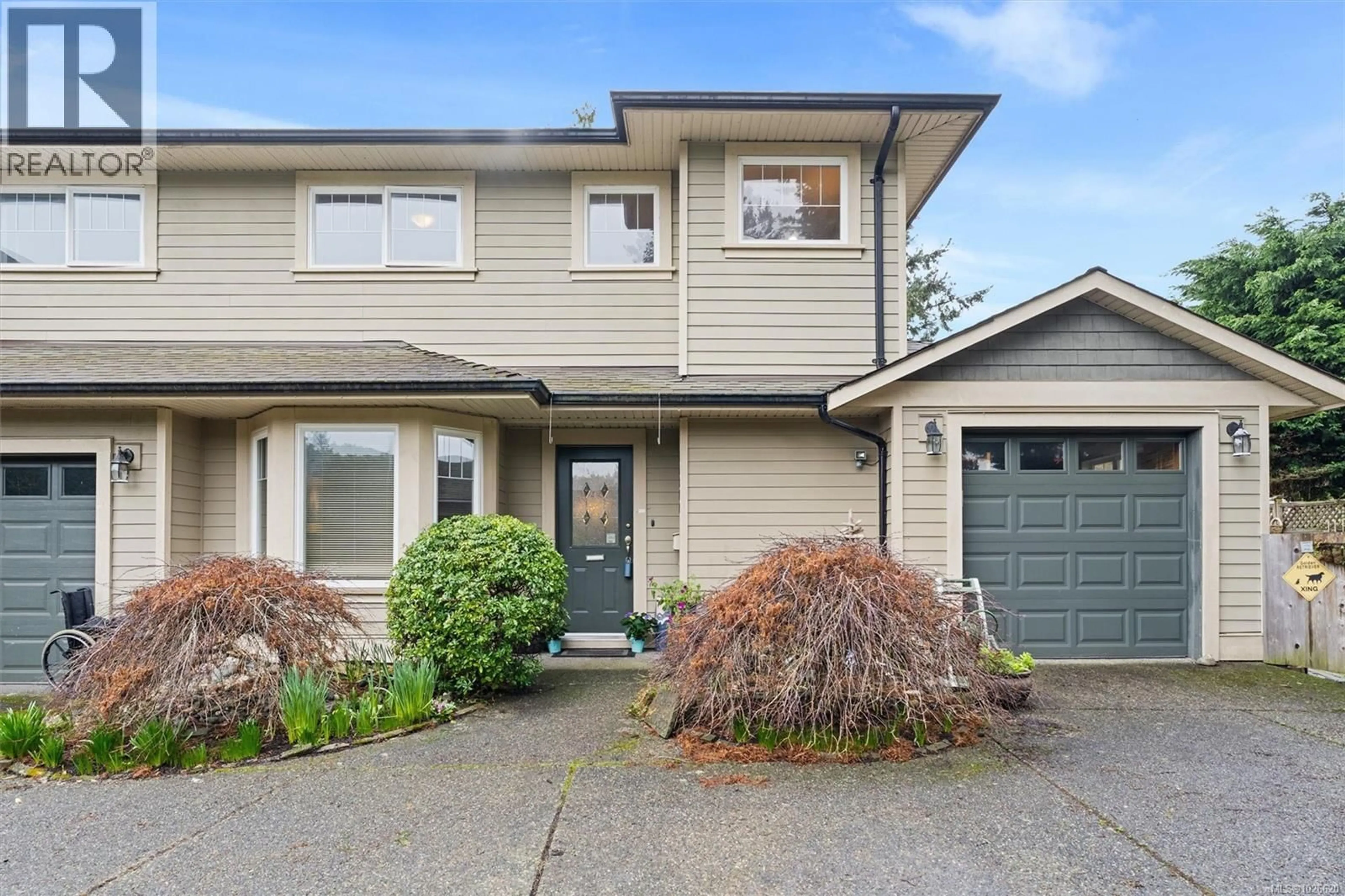 Home with vinyl exterior material, street for 10372 BOWERBANK ROAD, Sidney British Columbia V8L3L7