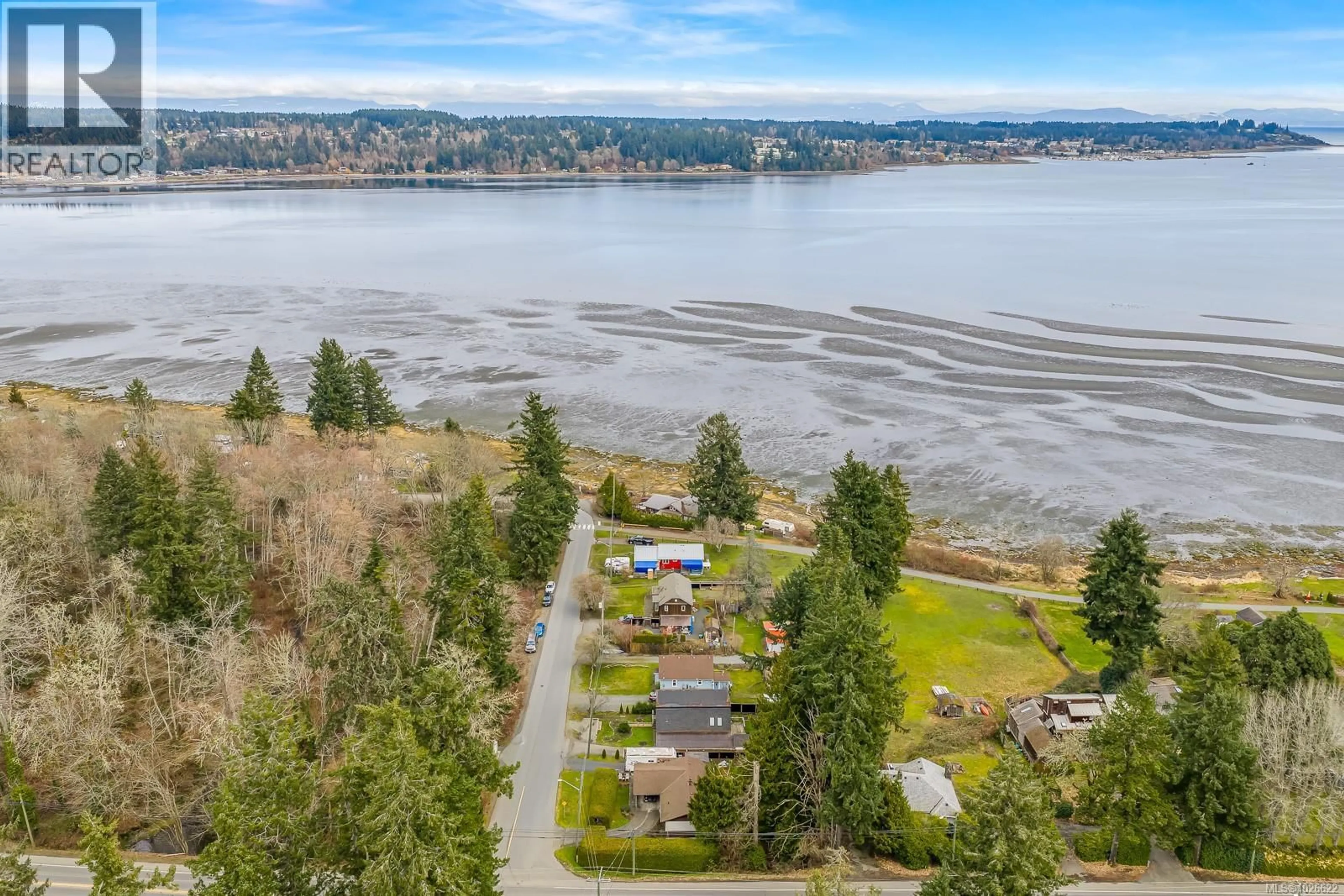 A pic from outside/outdoor area/front of a property/back of a property/a pic from drone, water/lake/river/ocean view for 3491 MILLARD ROAD, Courtenay British Columbia V9N9T9