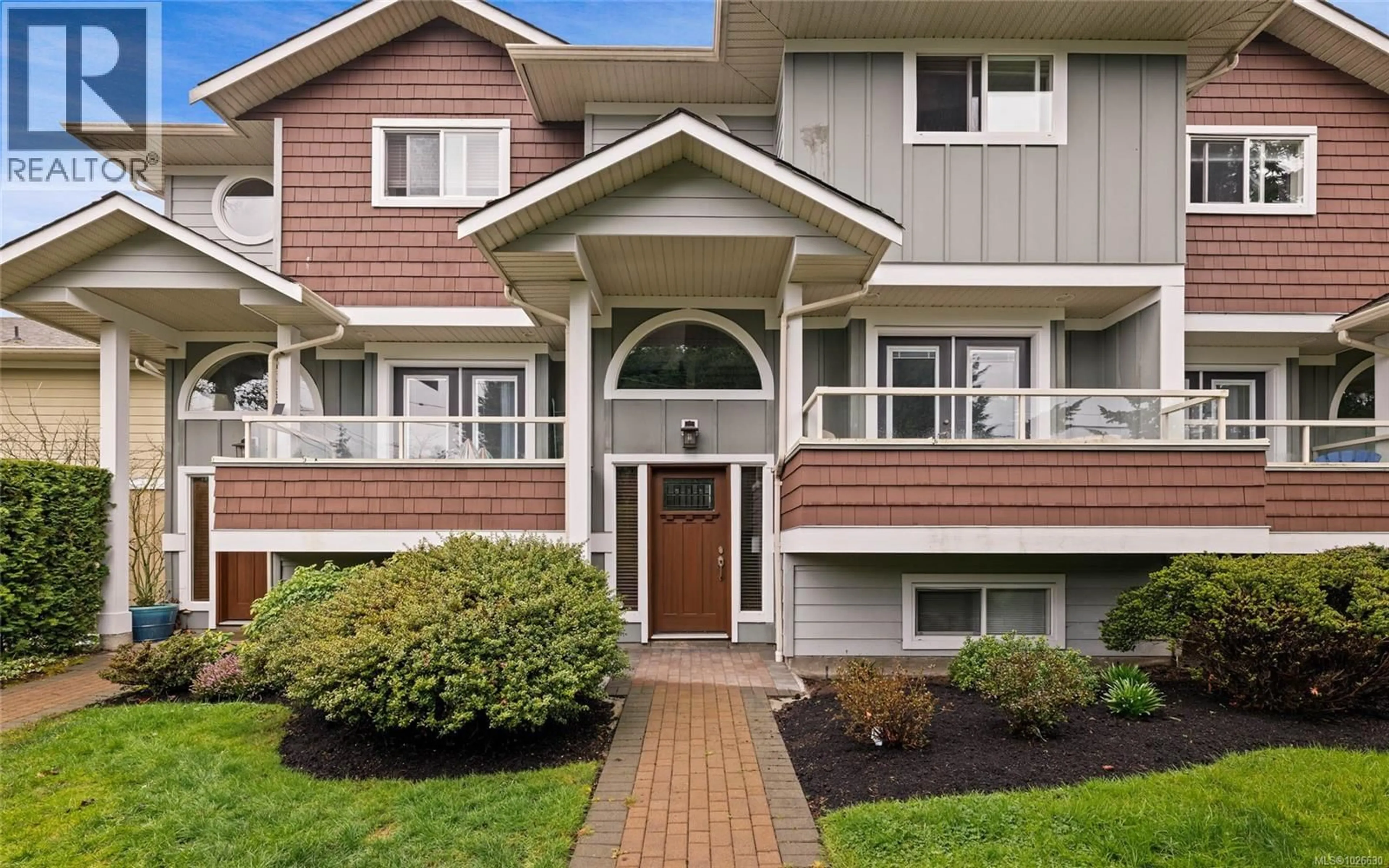 Home with vinyl exterior material, street for 525 HEATHERDALE LANE, Saanich British Columbia V8Z0A4