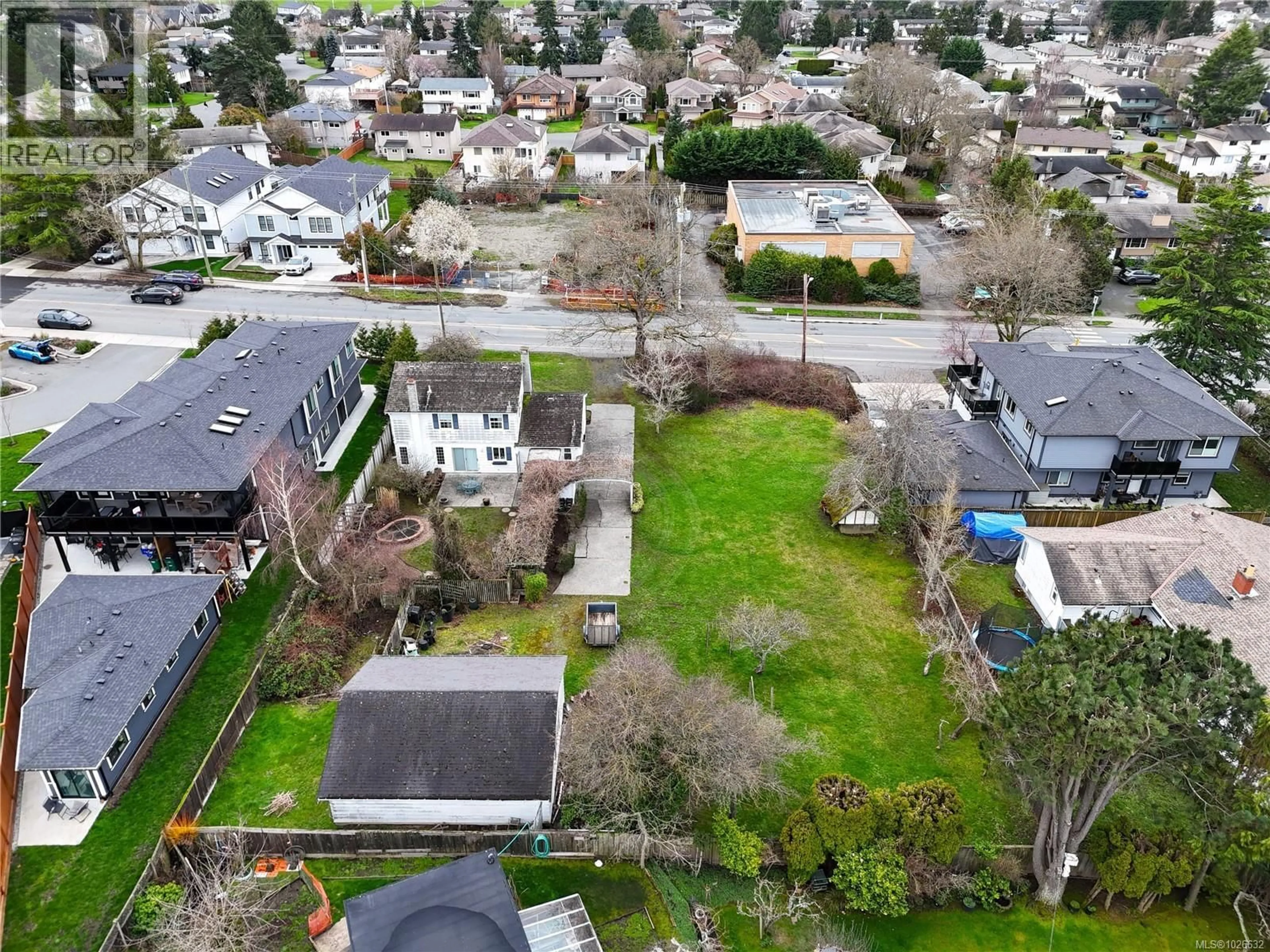 A pic from outside/outdoor area/front of a property/back of a property/a pic from drone, street for 1806 FELTHAM ROAD, Saanich British Columbia V8N4R8
