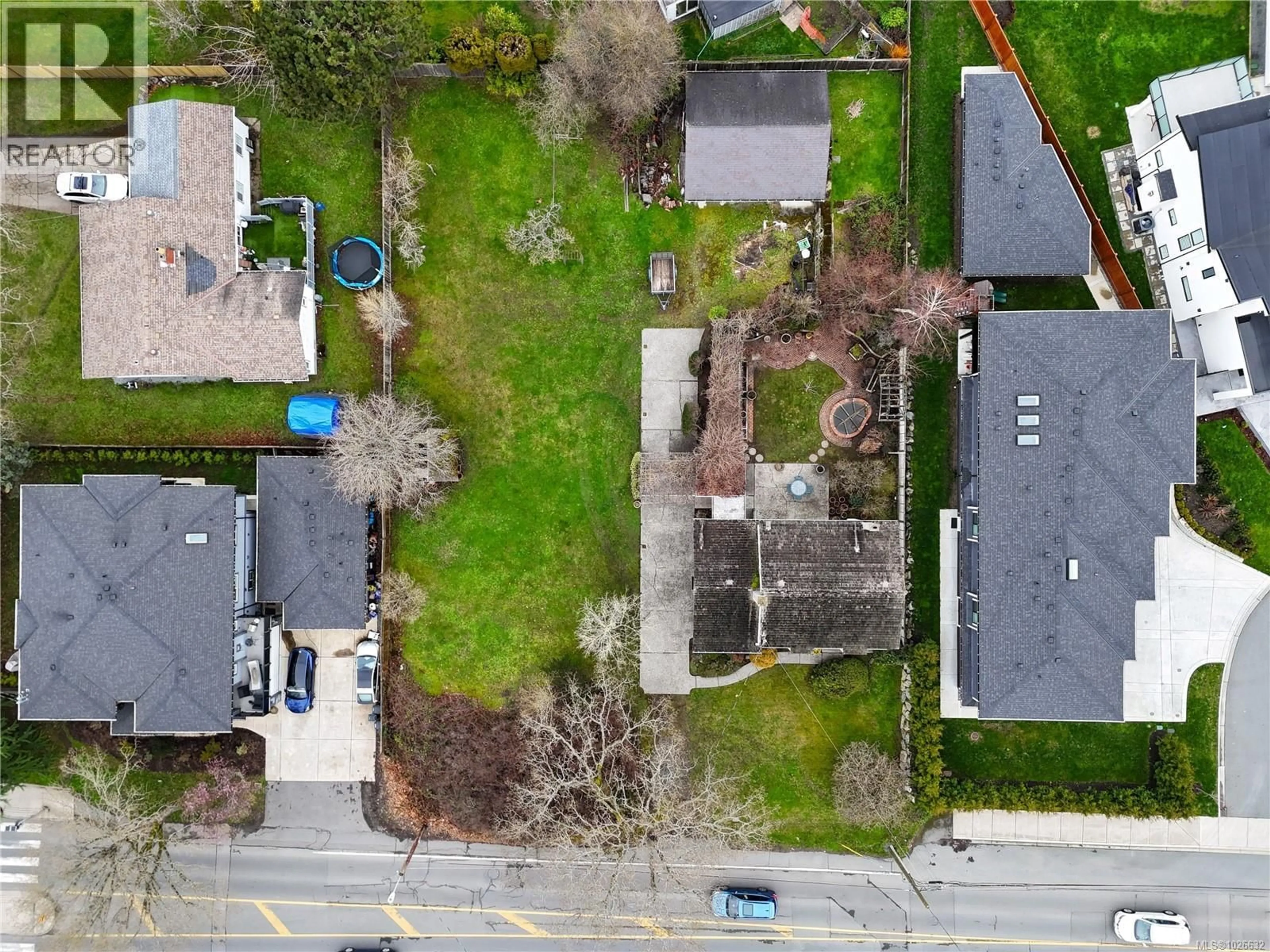 A pic from outside/outdoor area/front of a property/back of a property/a pic from drone, street for 1806 FELTHAM ROAD, Saanich British Columbia V8N4R8