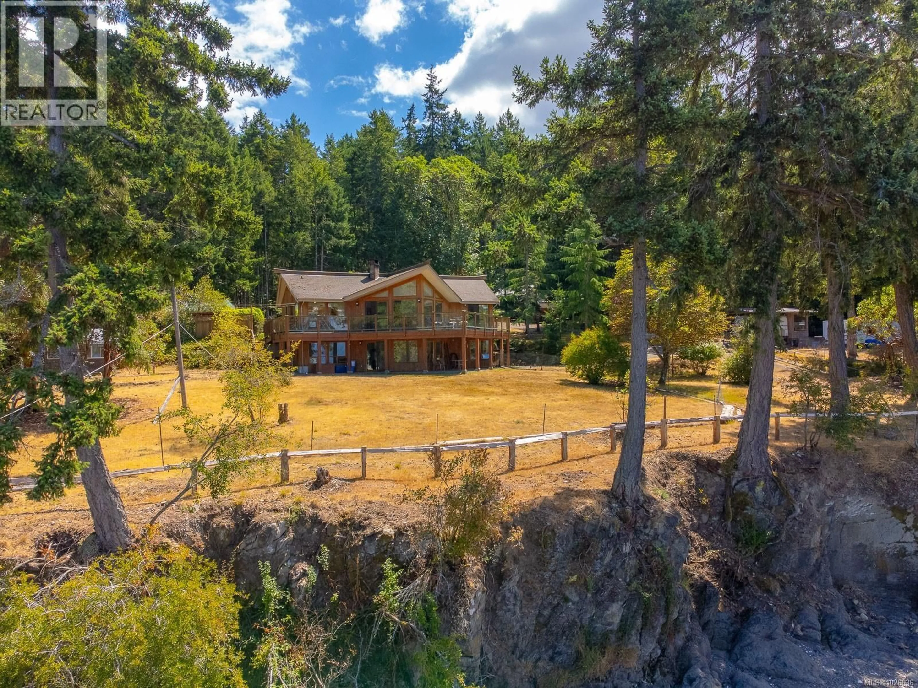 A pic from outside/outdoor area/front of a property/back of a property/a pic from drone, unknown for 150 JENKINS ROAD, Salt Spring British Columbia V8K2M9