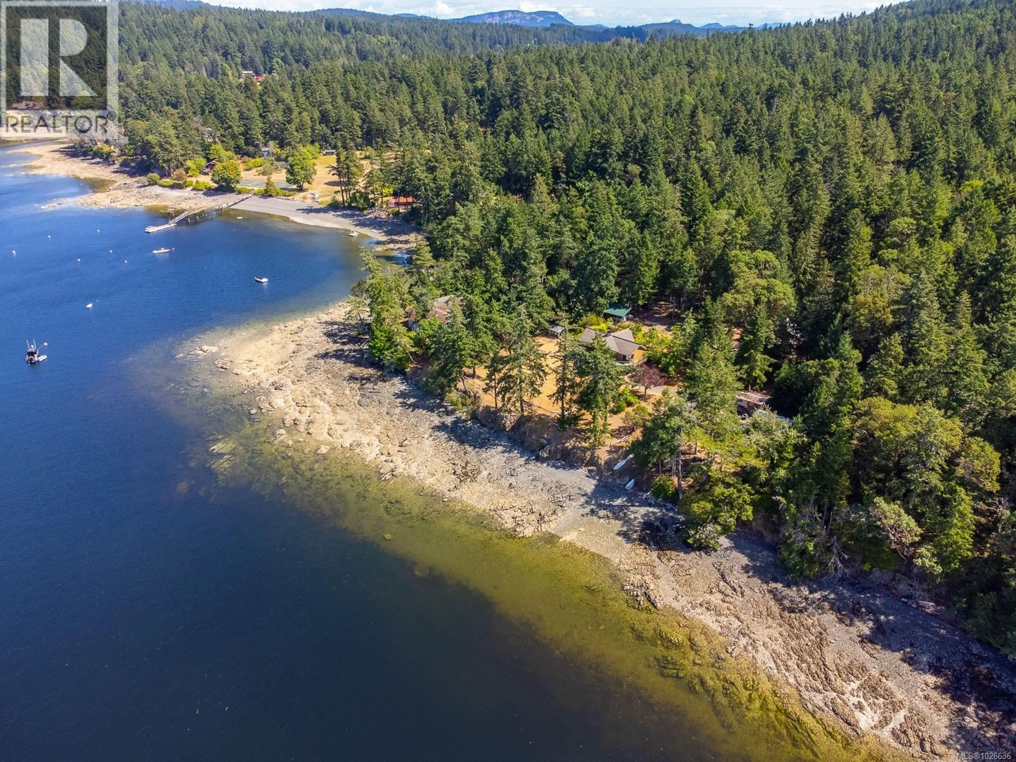 A pic from outside/outdoor area/front of a property/back of a property/a pic from drone, water/lake/river/ocean view for 150 JENKINS ROAD, Salt Spring British Columbia V8K2M9