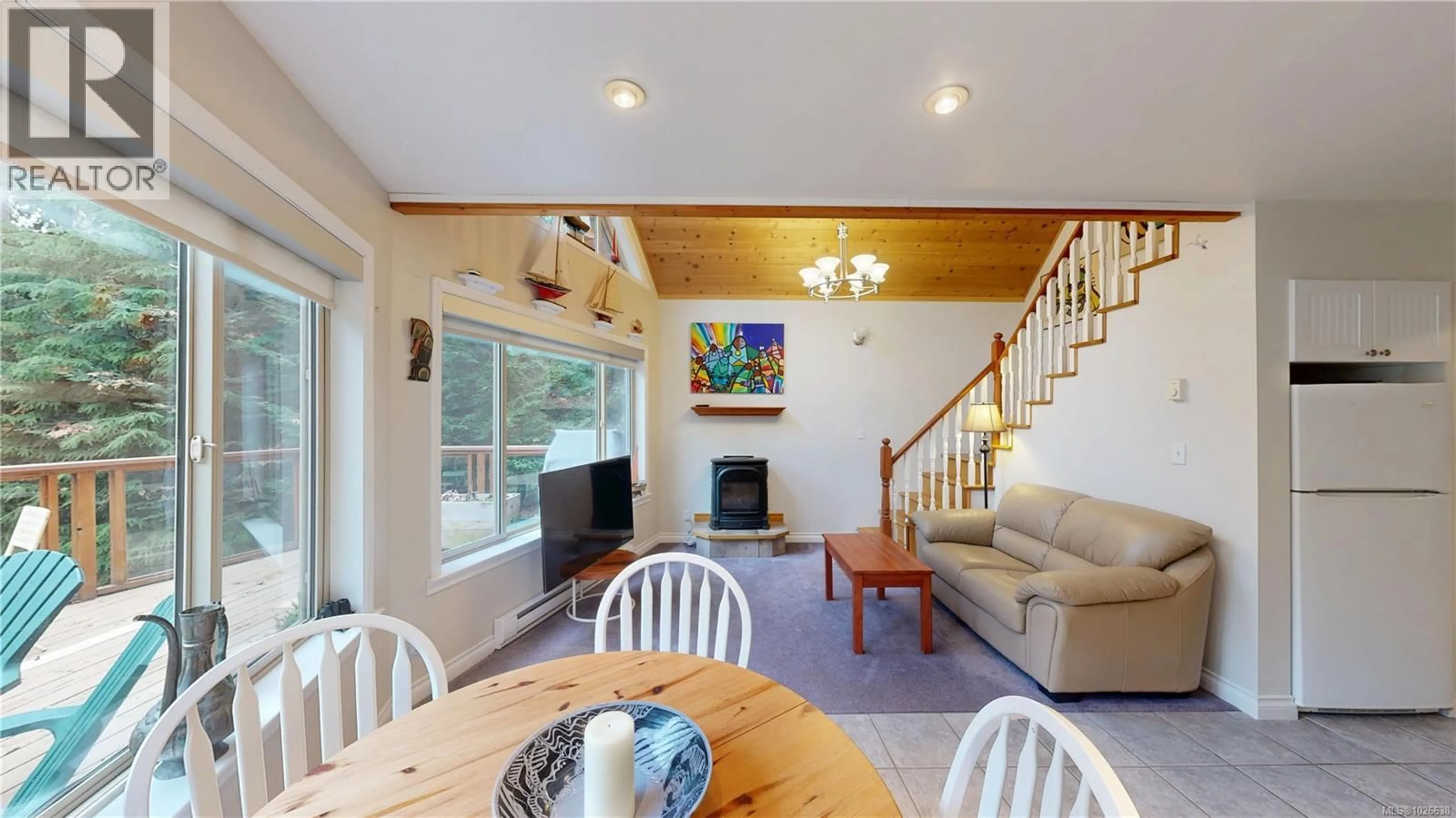 Living room with furniture, wood/laminate floor for 1120 CHAPPEL PLACE, Gabriola Island British Columbia V0R1X2