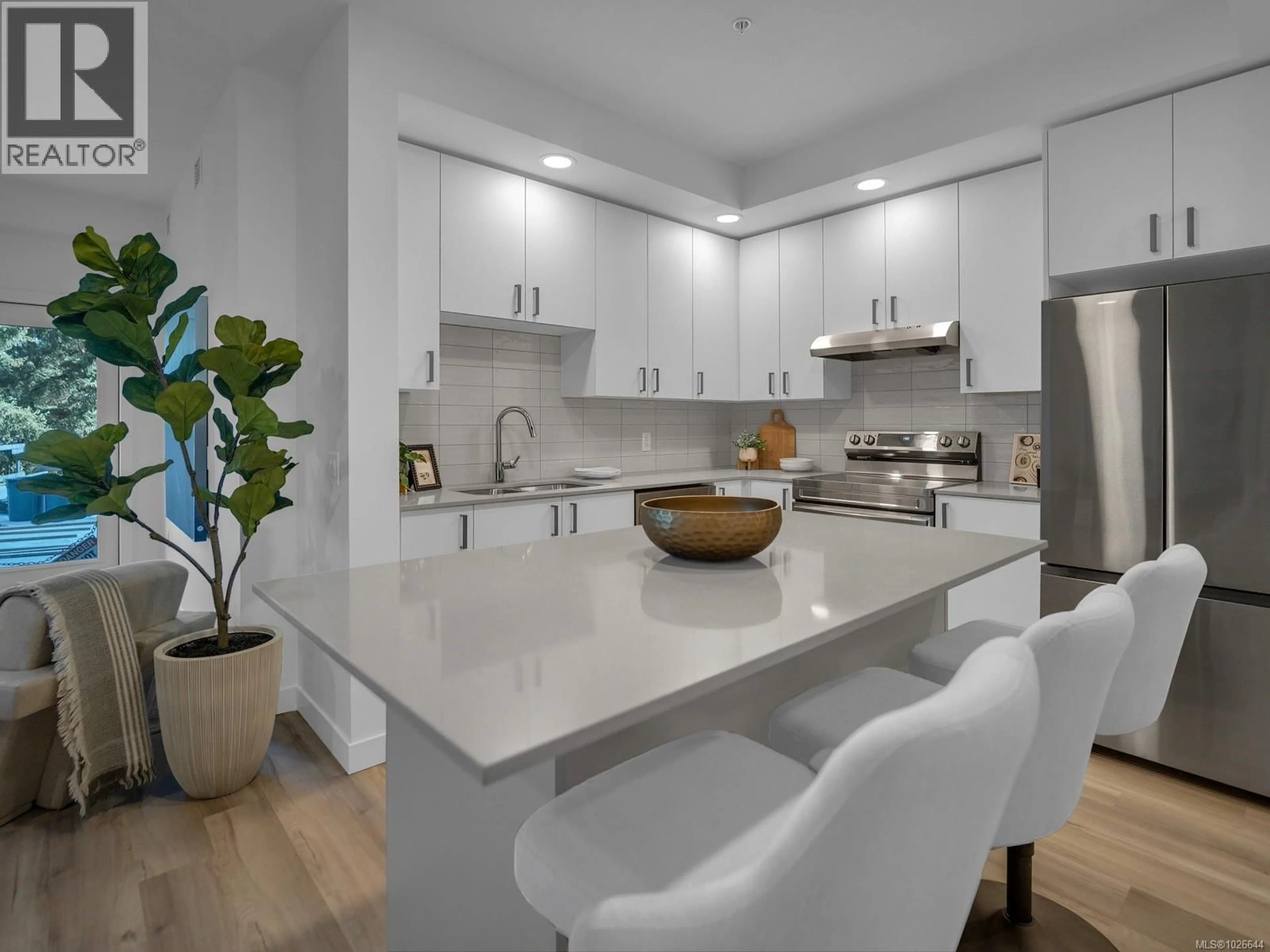 Open concept kitchen, ceramic/tile floor for 102 - 2390 CITY GATE BOULEVARD, Langford British Columbia V9B7A6