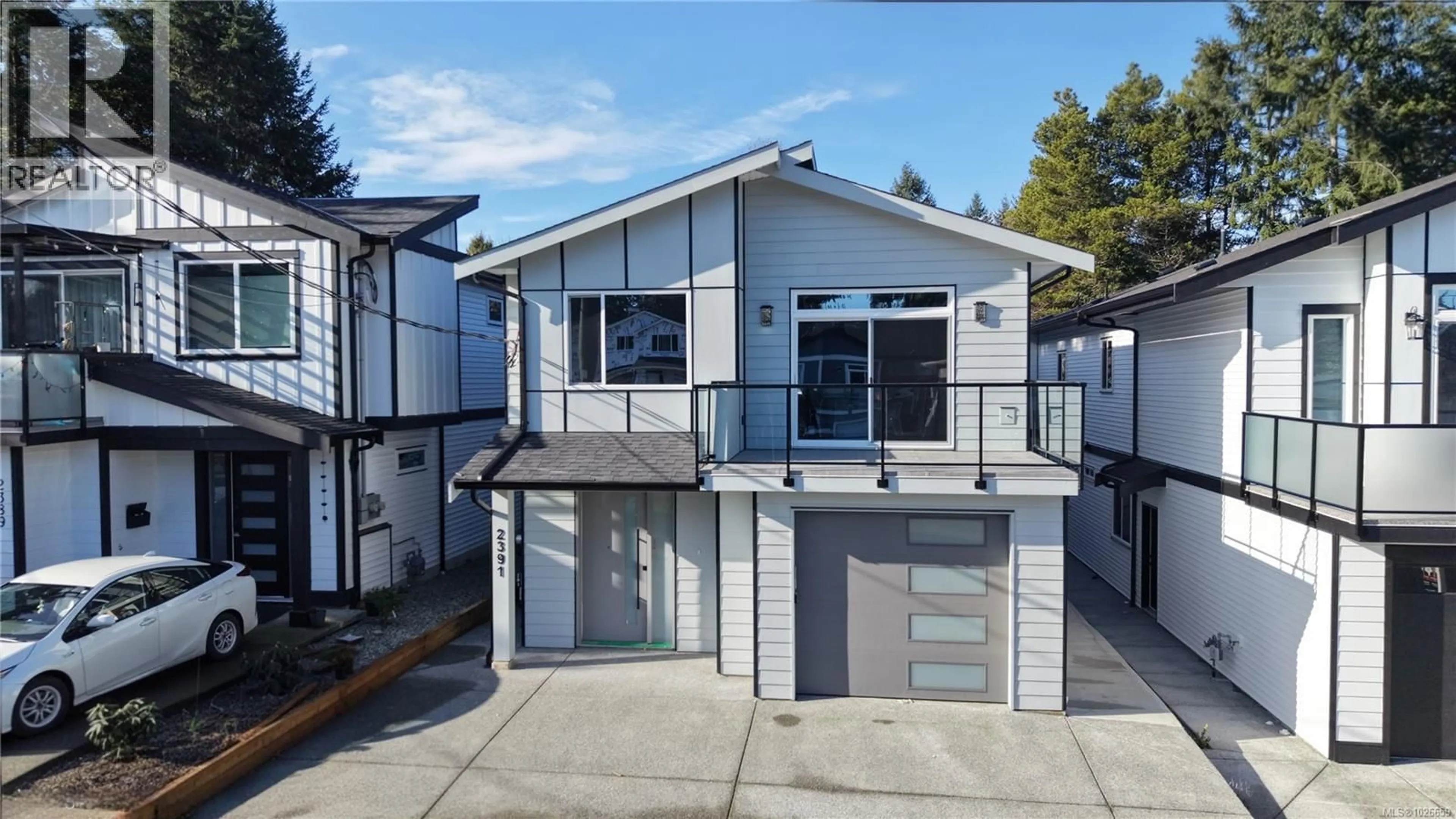 Home with vinyl exterior material, street for 2391 BARCLAY ROAD, Nanaimo British Columbia V9T3J8