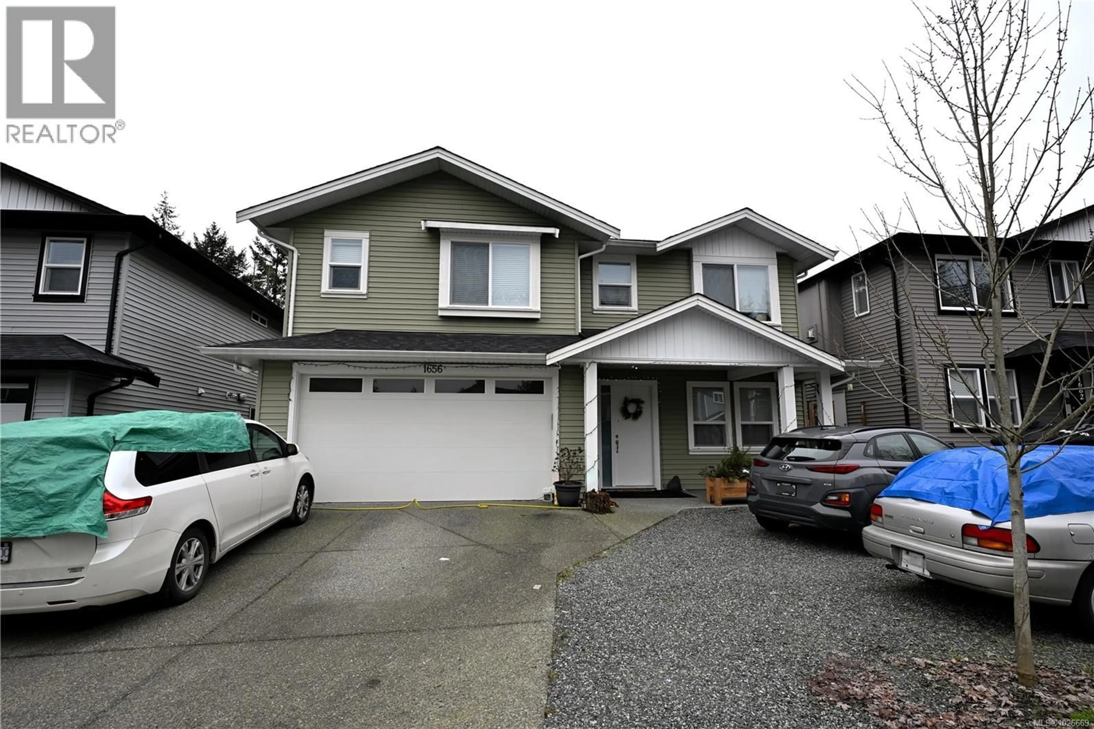 Home with vinyl exterior material, street for 1656 ROBERTA ROAD SOUTH, Nanaimo British Columbia V9X0B6