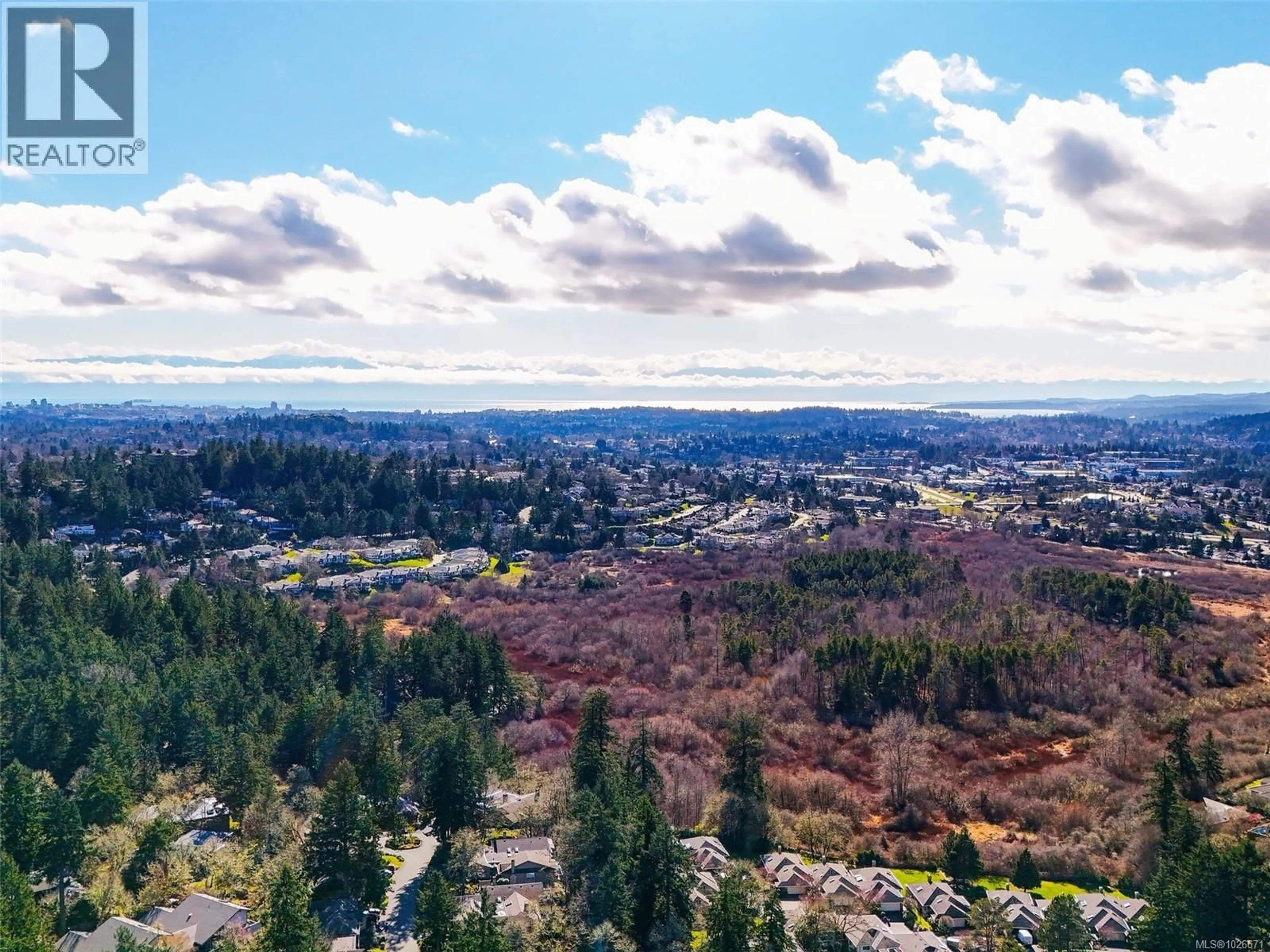 A pic from outside/outdoor area/front of a property/back of a property/a pic from drone, forest/trees view for 930 ROYAL OAK DRIVE, Saanich British Columbia V8X3T4