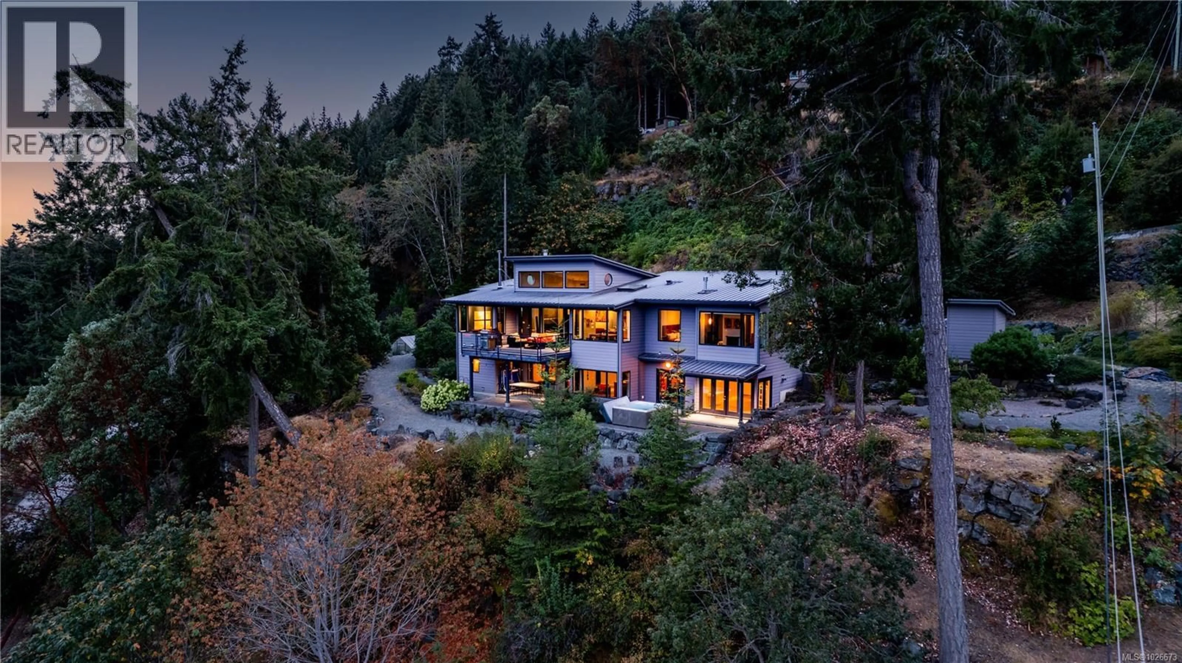 A pic from outside/outdoor area/front of a property/back of a property/a pic from drone, mountain view for 6088 GENOA BAY ROAD, Duncan British Columbia V9L5Y5