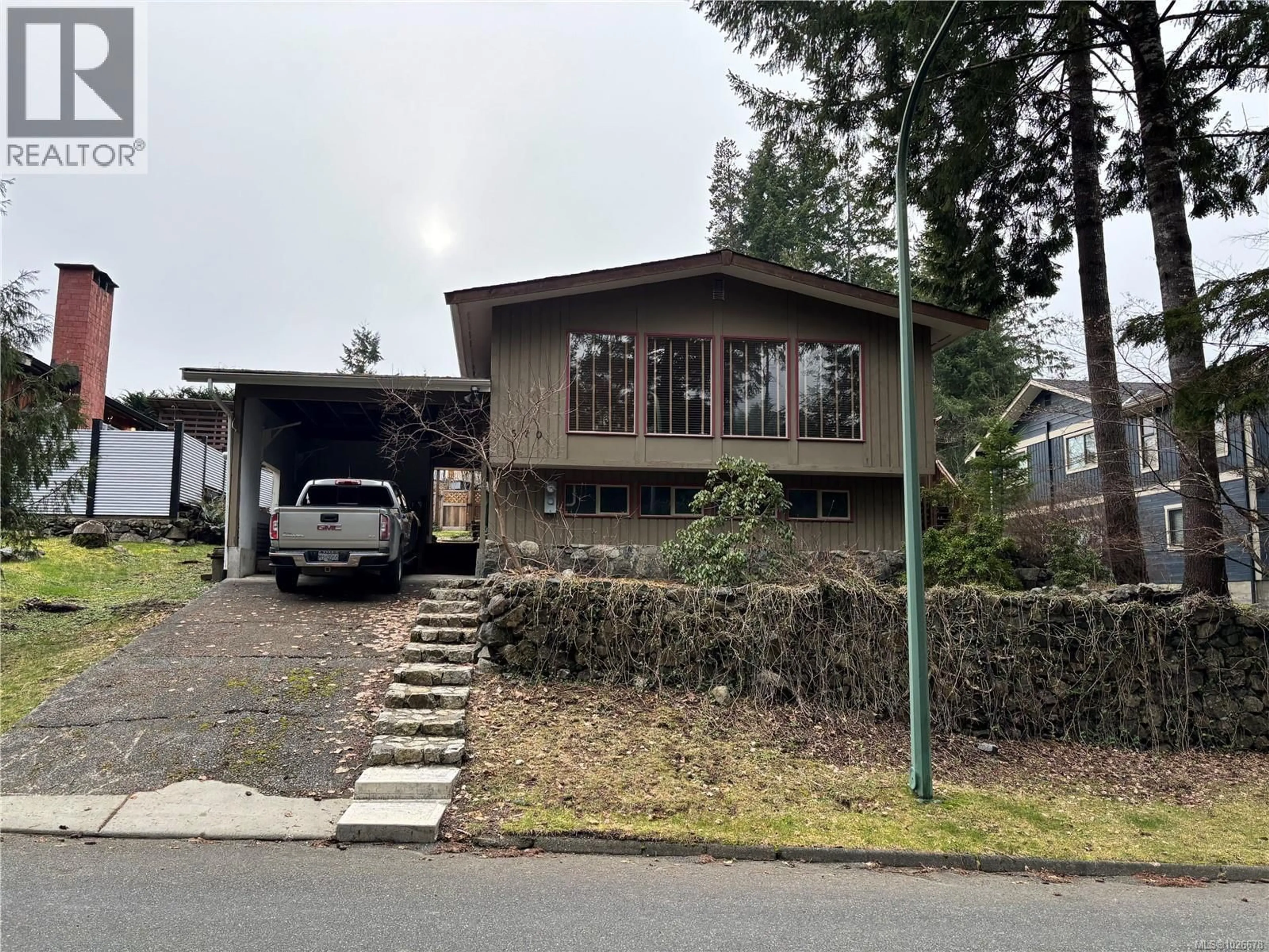 Home with vinyl exterior material, mountain view for 570 EAGLE CRESCENT, Gold River British Columbia V0P1G0
