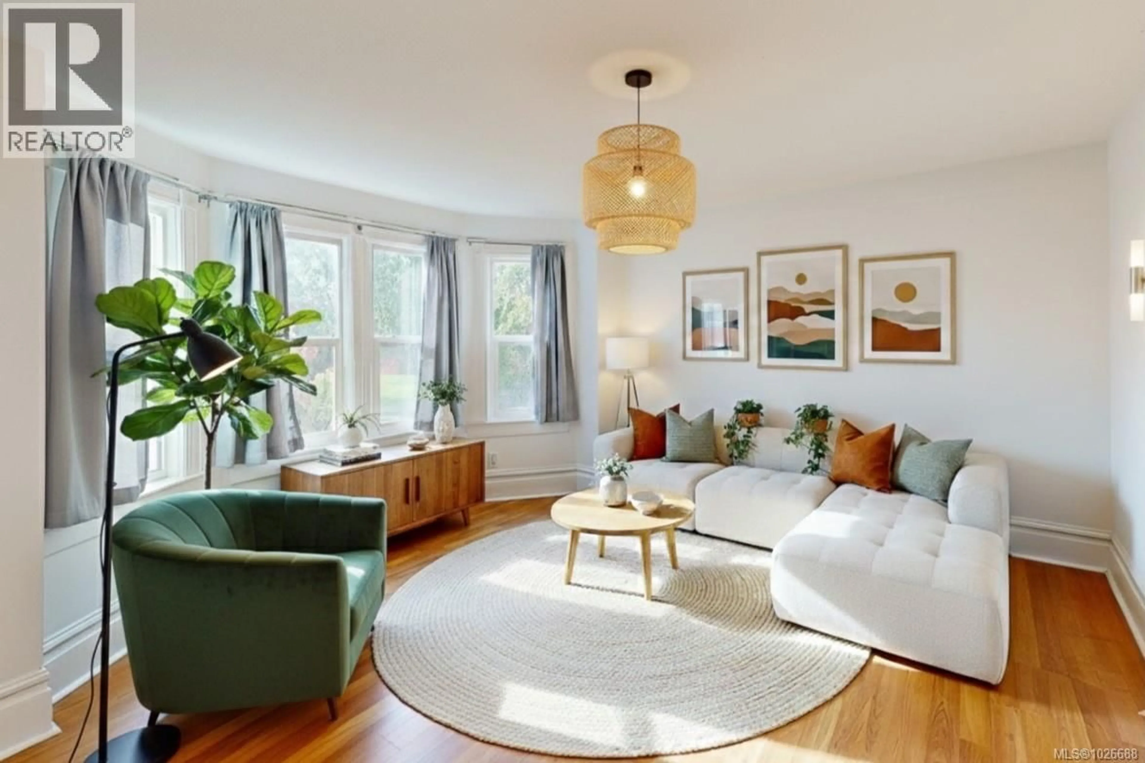 Living room with furniture, wood/laminate floor for 2943 CEDAR HILL ROAD, Victoria British Columbia V8T3H8