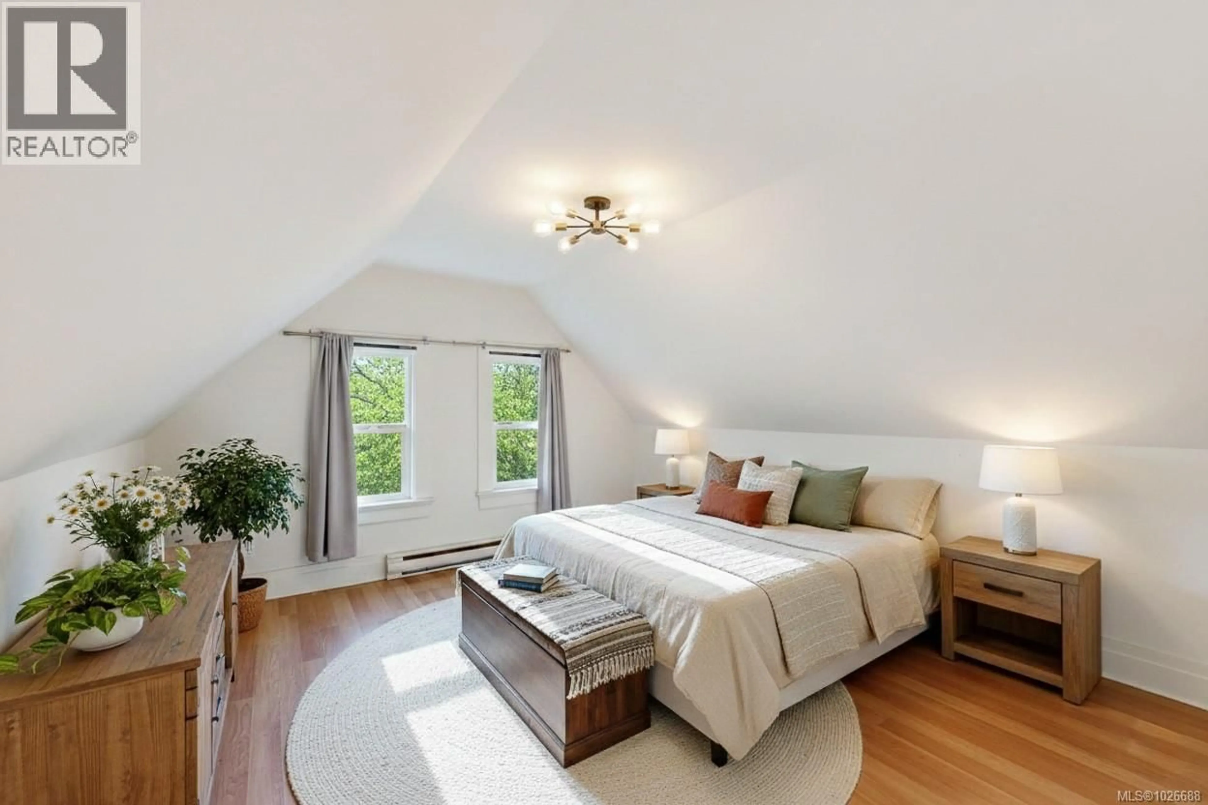 Bedroom with bed, wood/laminate floor for 2943 CEDAR HILL ROAD, Victoria British Columbia V8T3H8