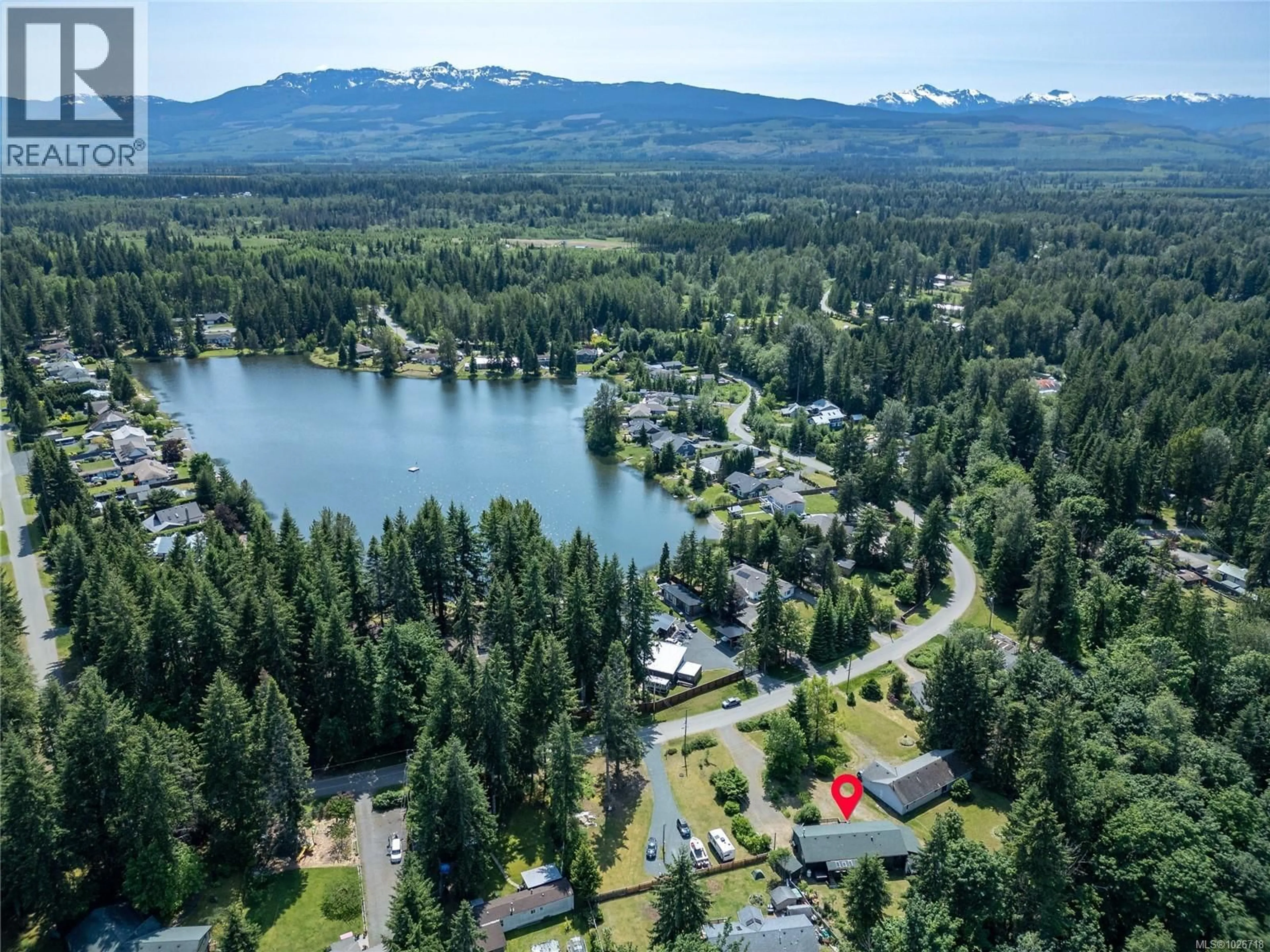 A pic from outside/outdoor area/front of a property/back of a property/a pic from drone, water/lake/river/ocean view for 9437 MARTIN PARK DRIVE, Black Creek British Columbia V9J1C3