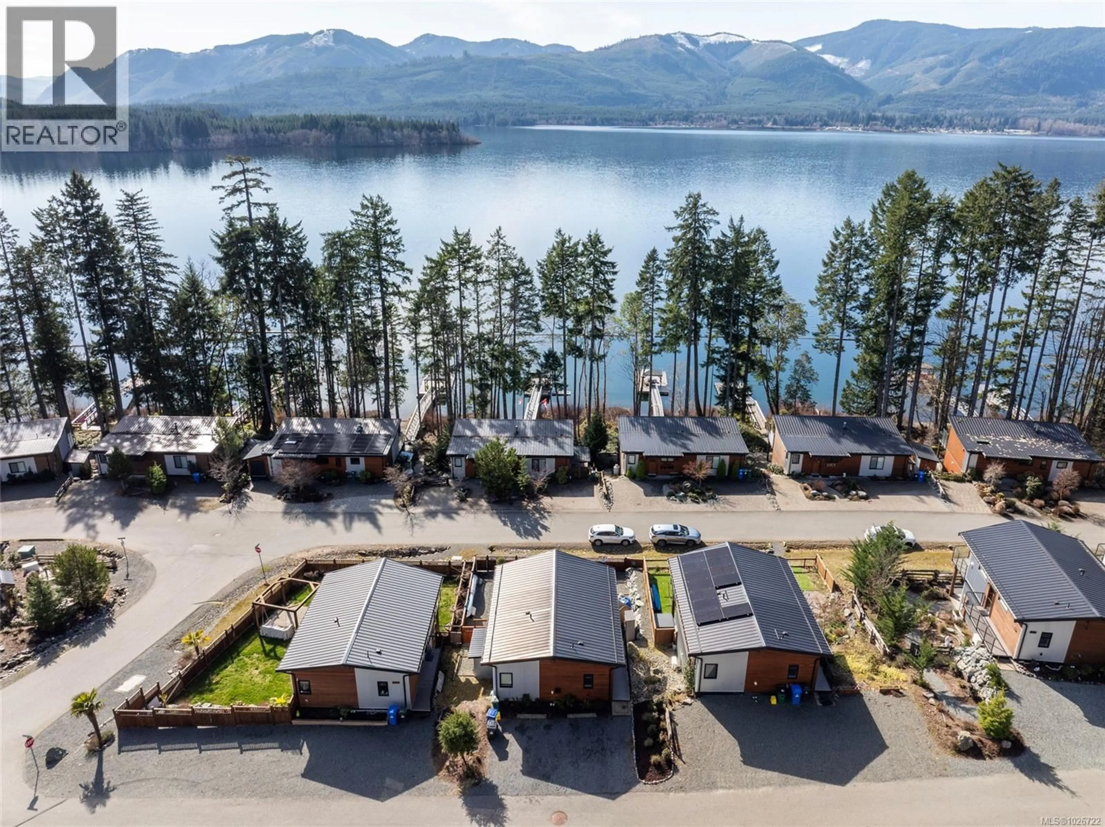 A pic from outside/outdoor area/front of a property/back of a property/a pic from drone, water/lake/river/ocean view for 7429 COTTAGE WAY, Lake Cowichan British Columbia V0R2G1