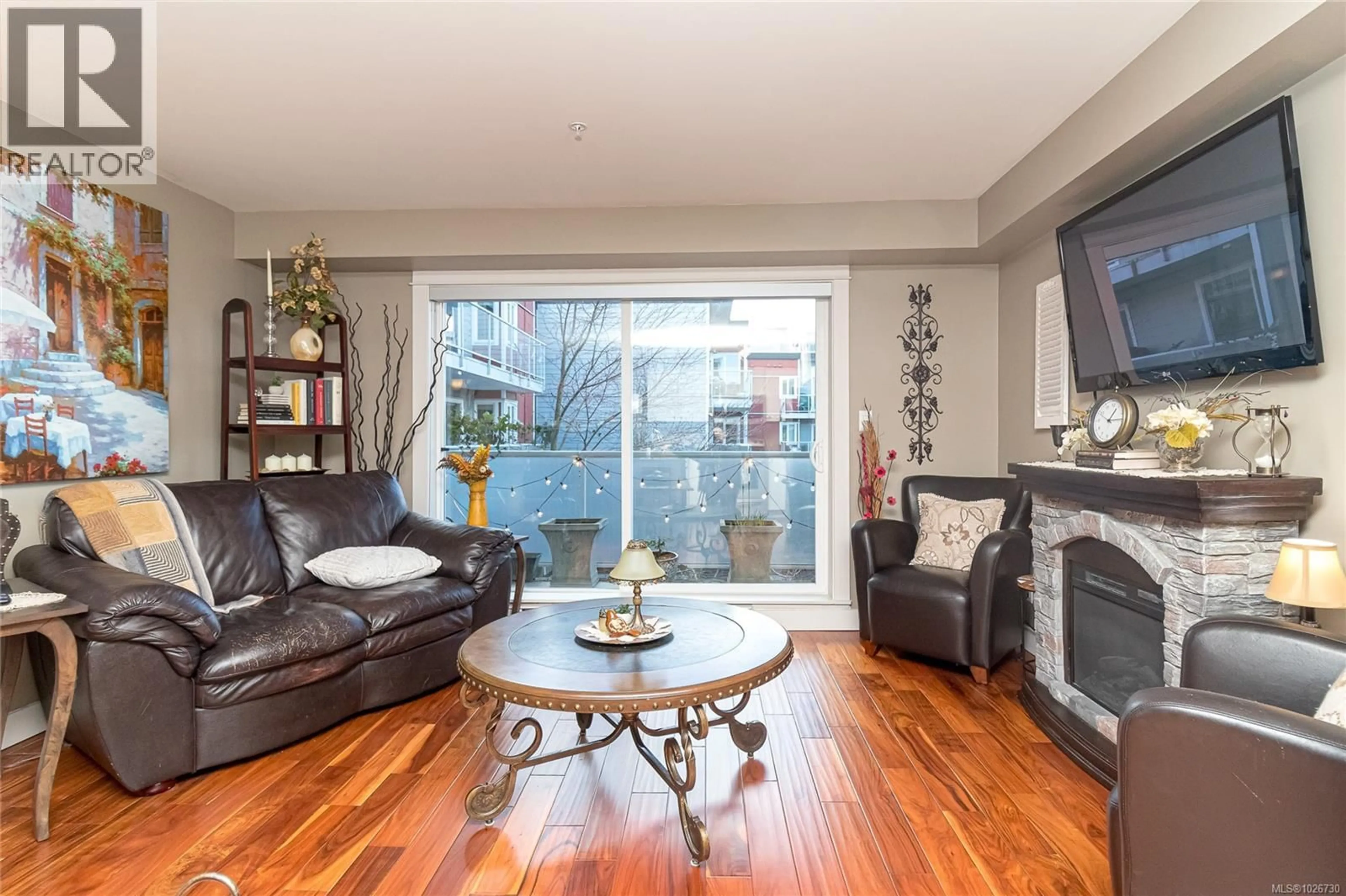 Living room with furniture, wood/laminate floor for 312 - 1315 ESQUIMALT ROAD, Esquimalt British Columbia V9A3P5