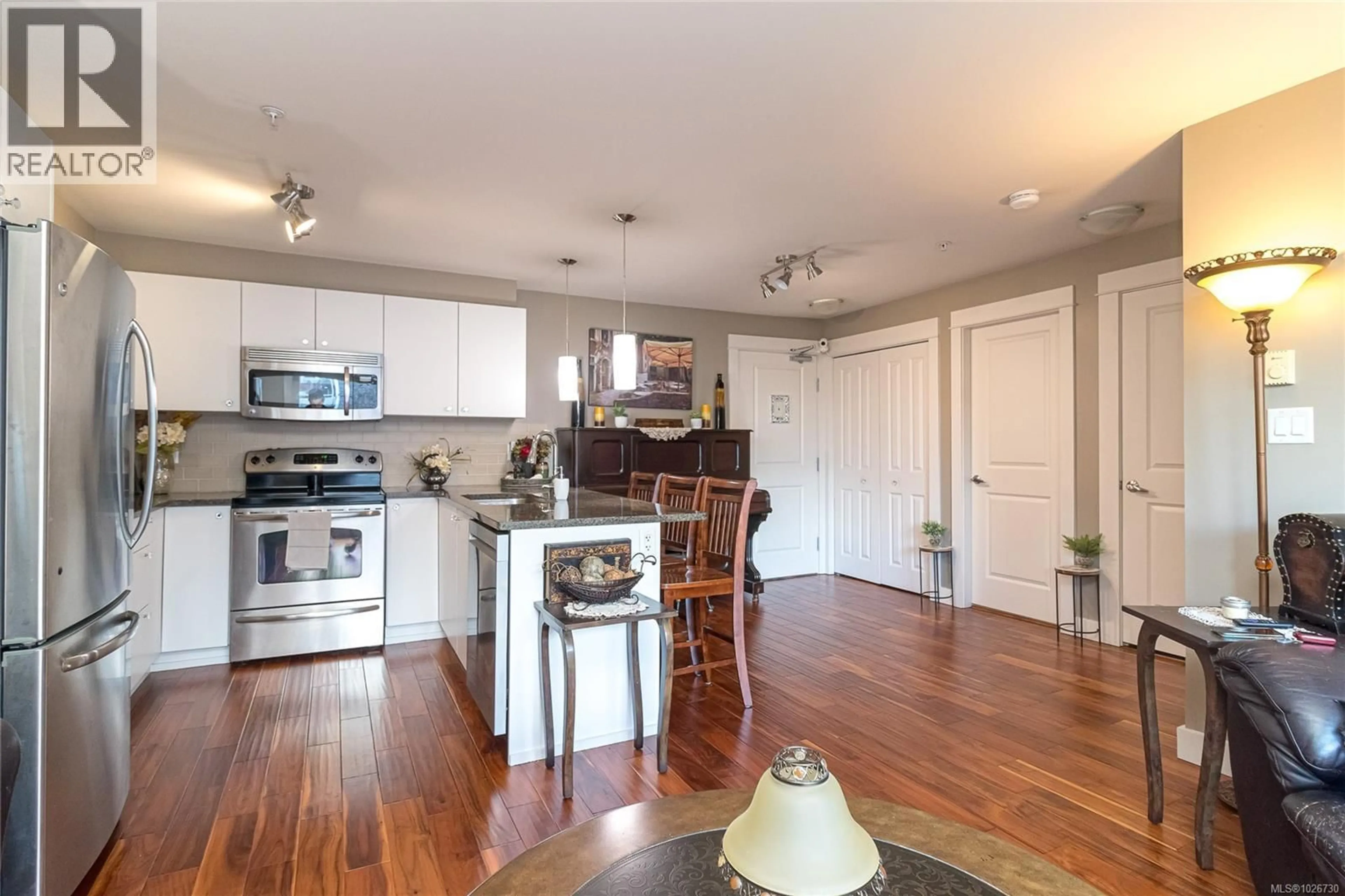 Open concept kitchen, wood/laminate floor for 312 - 1315 ESQUIMALT ROAD, Esquimalt British Columbia V9A3P5