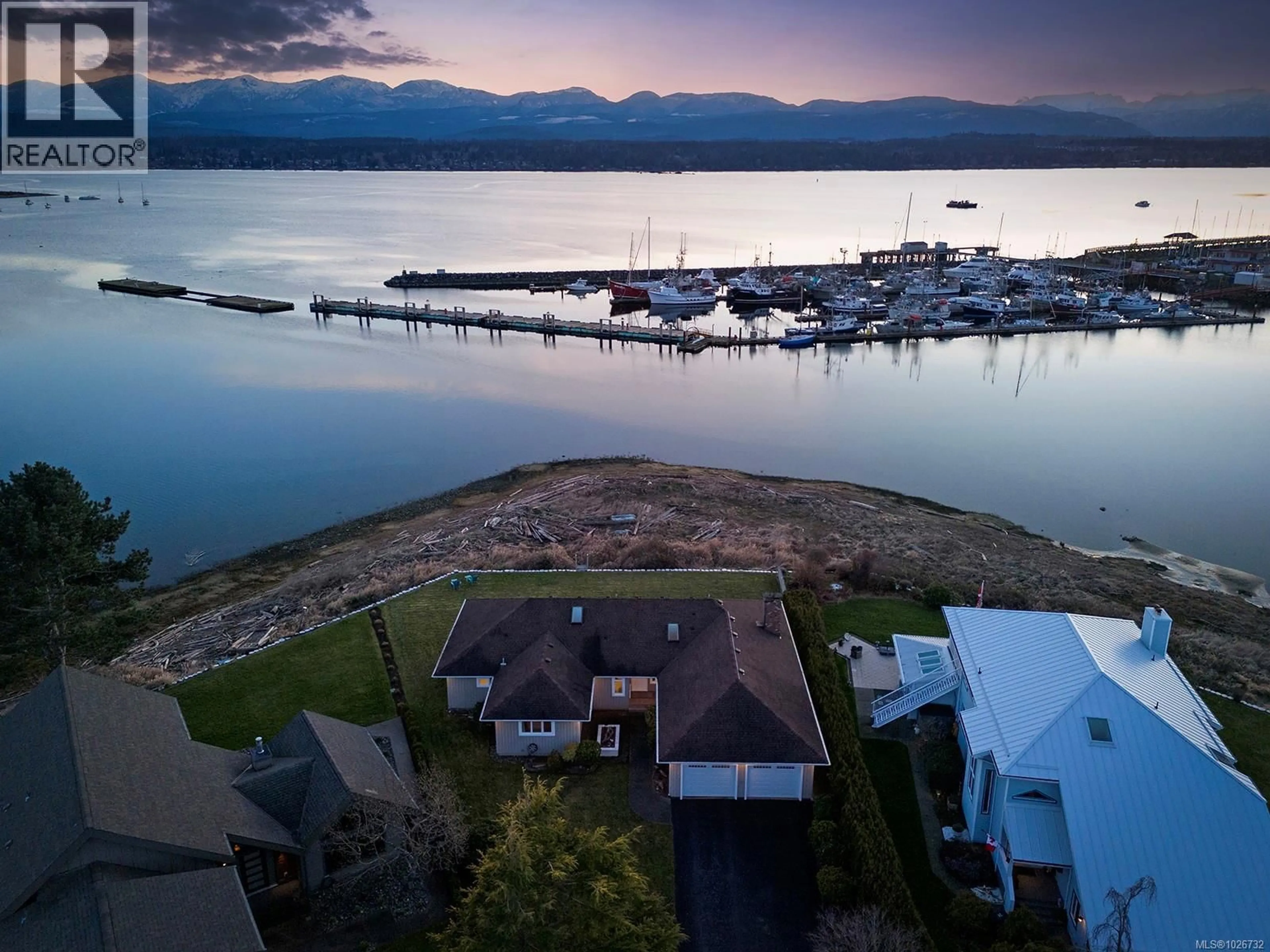 A pic from outside/outdoor area/front of a property/back of a property/a pic from drone, water/lake/river/ocean view for 65 JANE PLACE, Comox British Columbia V9M3N3