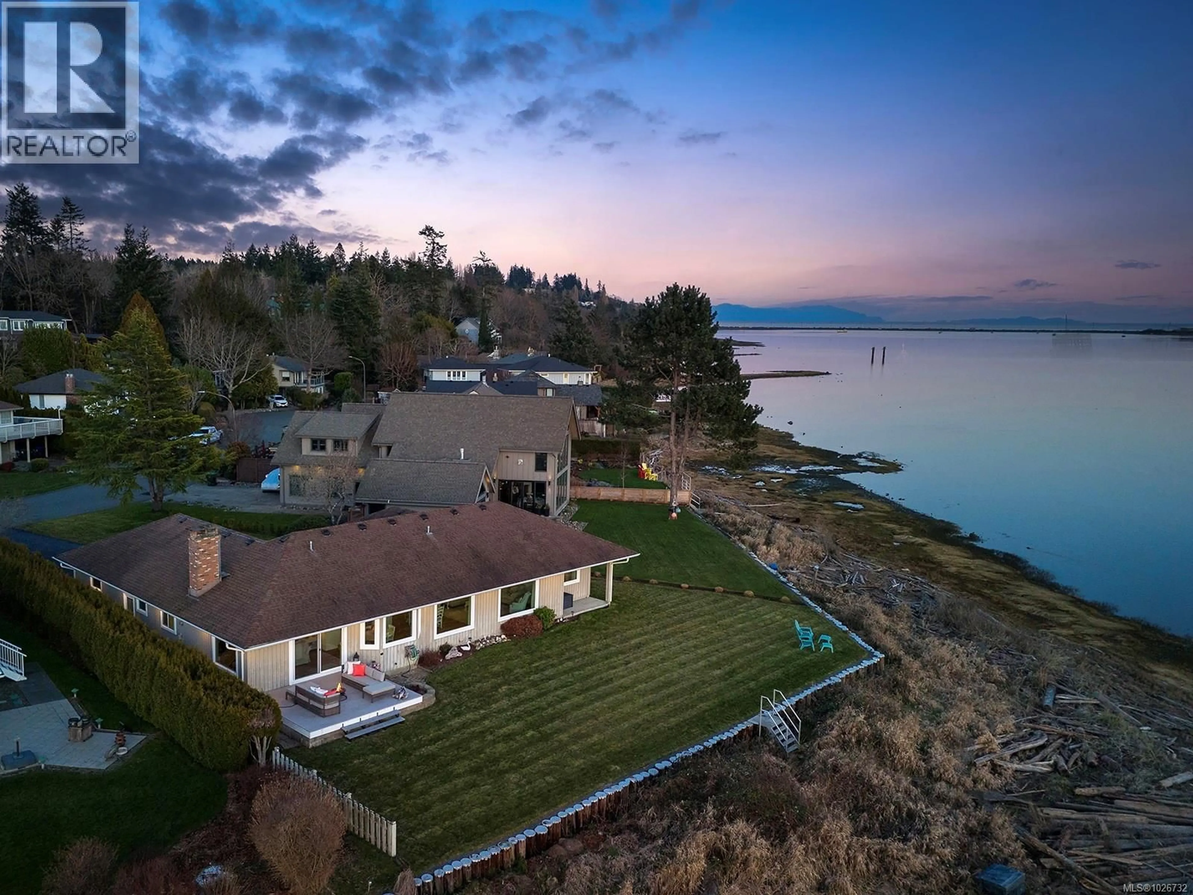 A pic from outside/outdoor area/front of a property/back of a property/a pic from drone, water/lake/river/ocean view for 65 JANE PLACE, Comox British Columbia V9M3N3