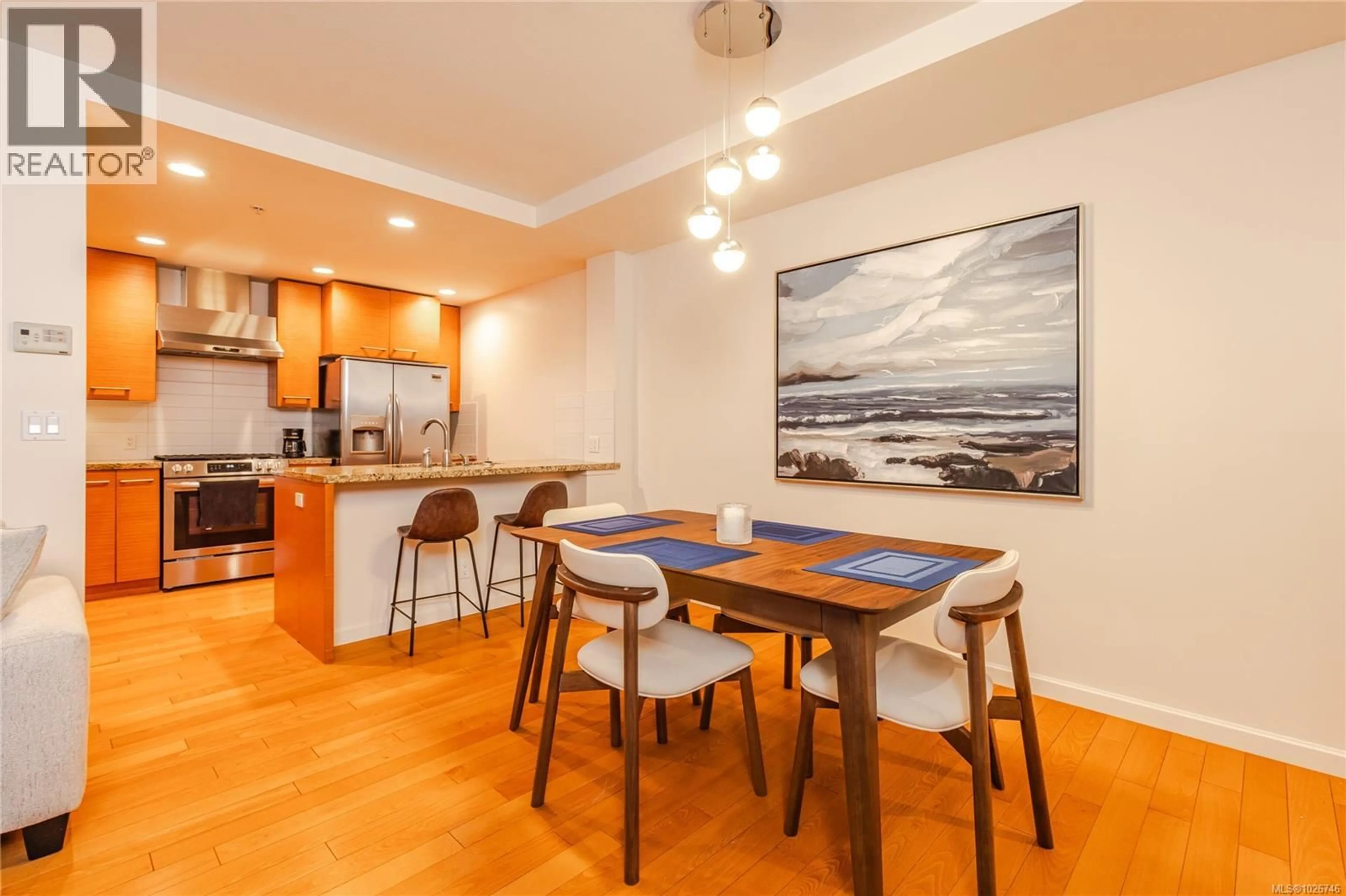 Open concept kitchen, wood/laminate floor for CY04 - 38 FRONT STREET, Nanaimo British Columbia V9R0B8