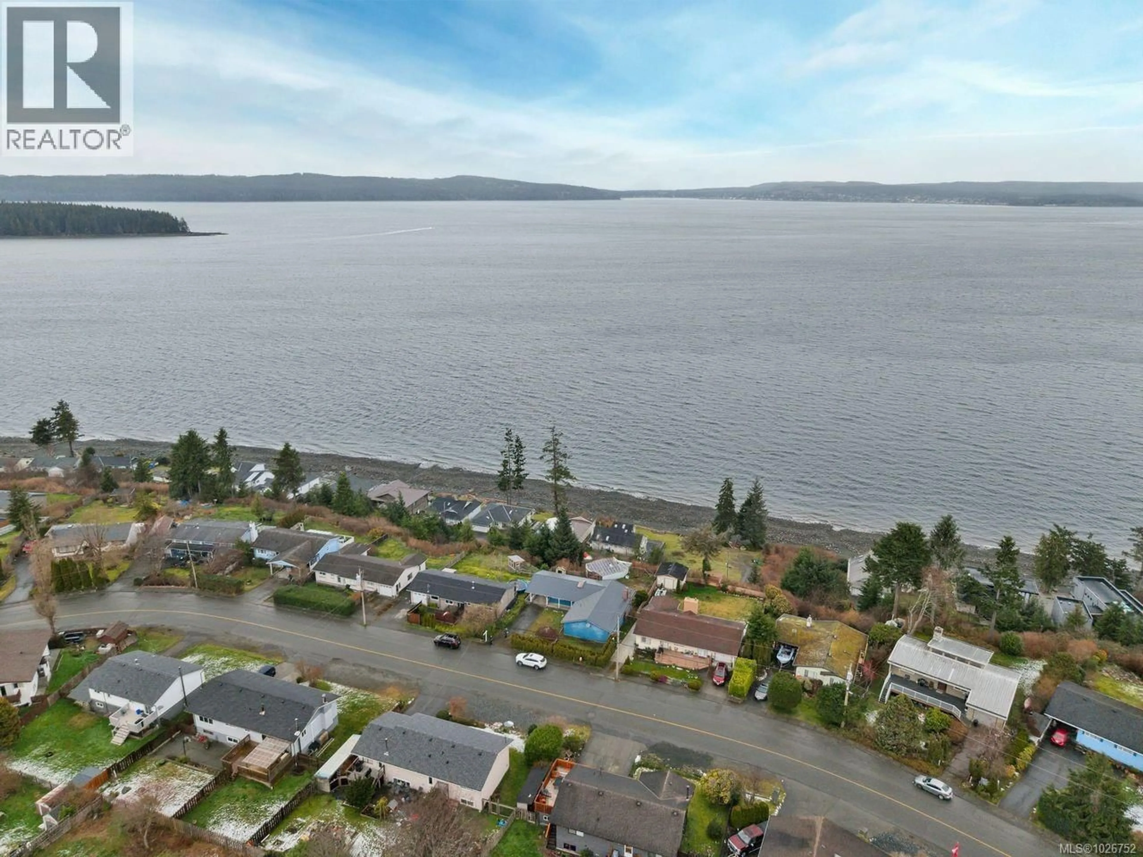 A pic from outside/outdoor area/front of a property/back of a property/a pic from drone, water/lake/river/ocean view for 2264 HADDINGTON CRESCENT, Port McNeill British Columbia V0N2R0