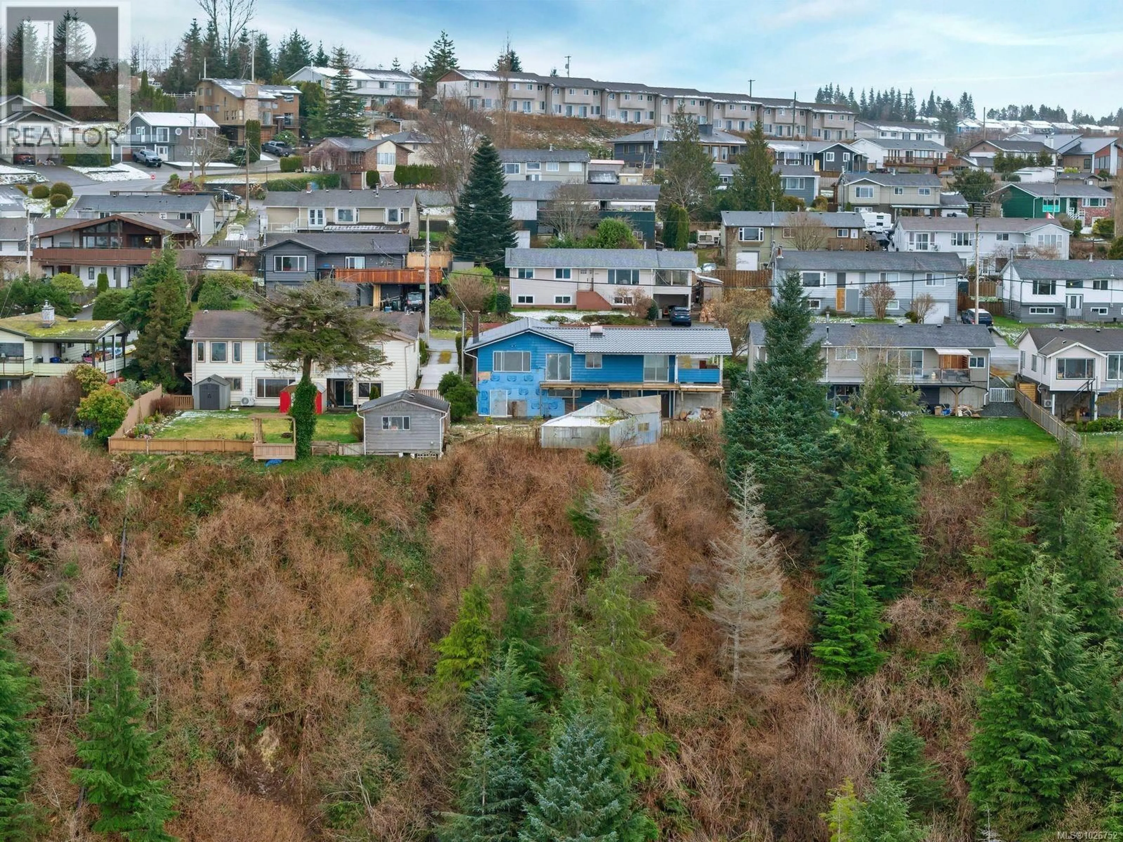 A pic from outside/outdoor area/front of a property/back of a property/a pic from drone, mountain view for 2264 HADDINGTON CRESCENT, Port McNeill British Columbia V0N2R0