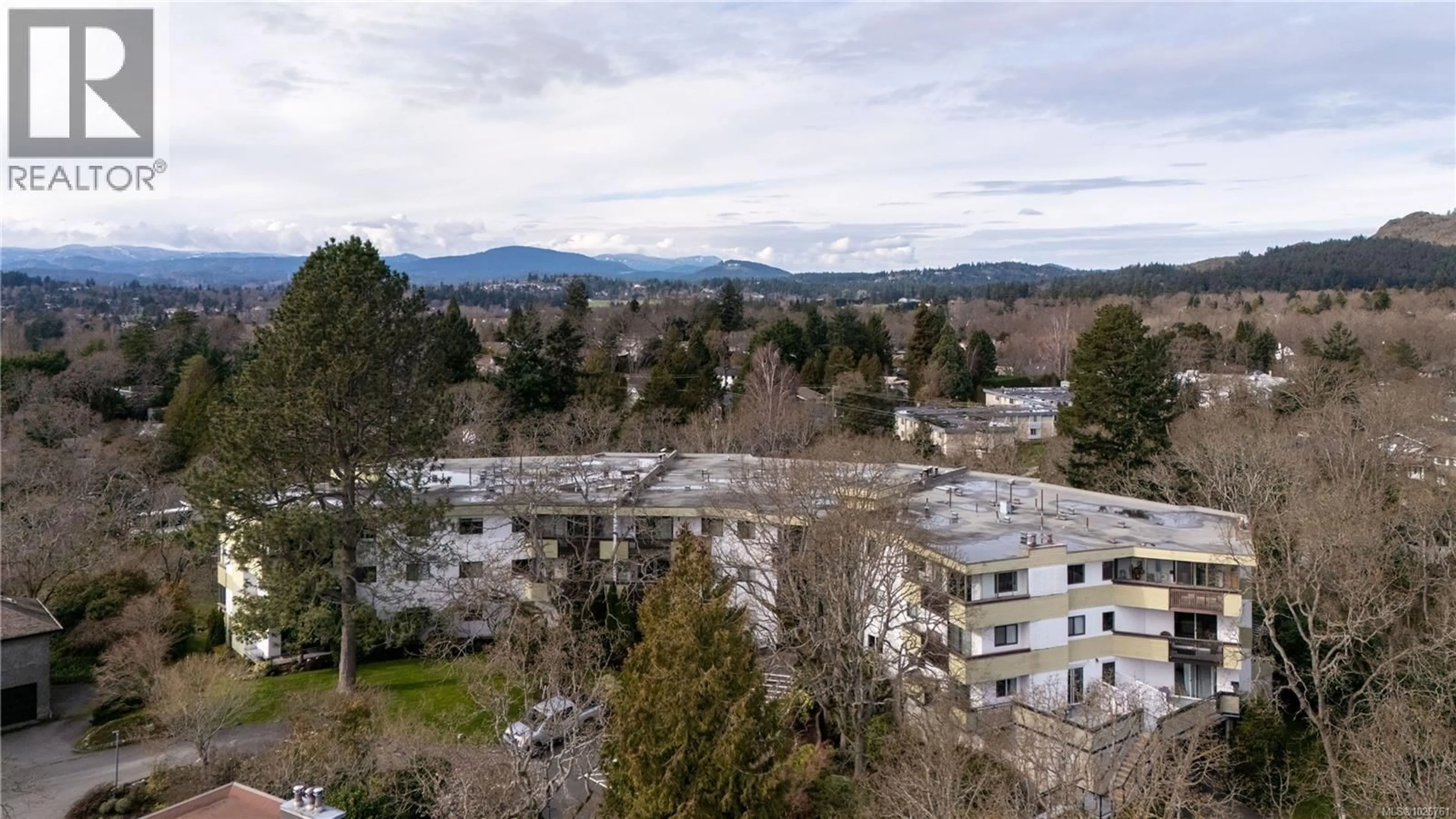 A pic from outside/outdoor area/front of a property/back of a property/a pic from drone, mountain view for 116 - 3962 CEDAR HILL ROAD, Saanich British Columbia V8N3B8