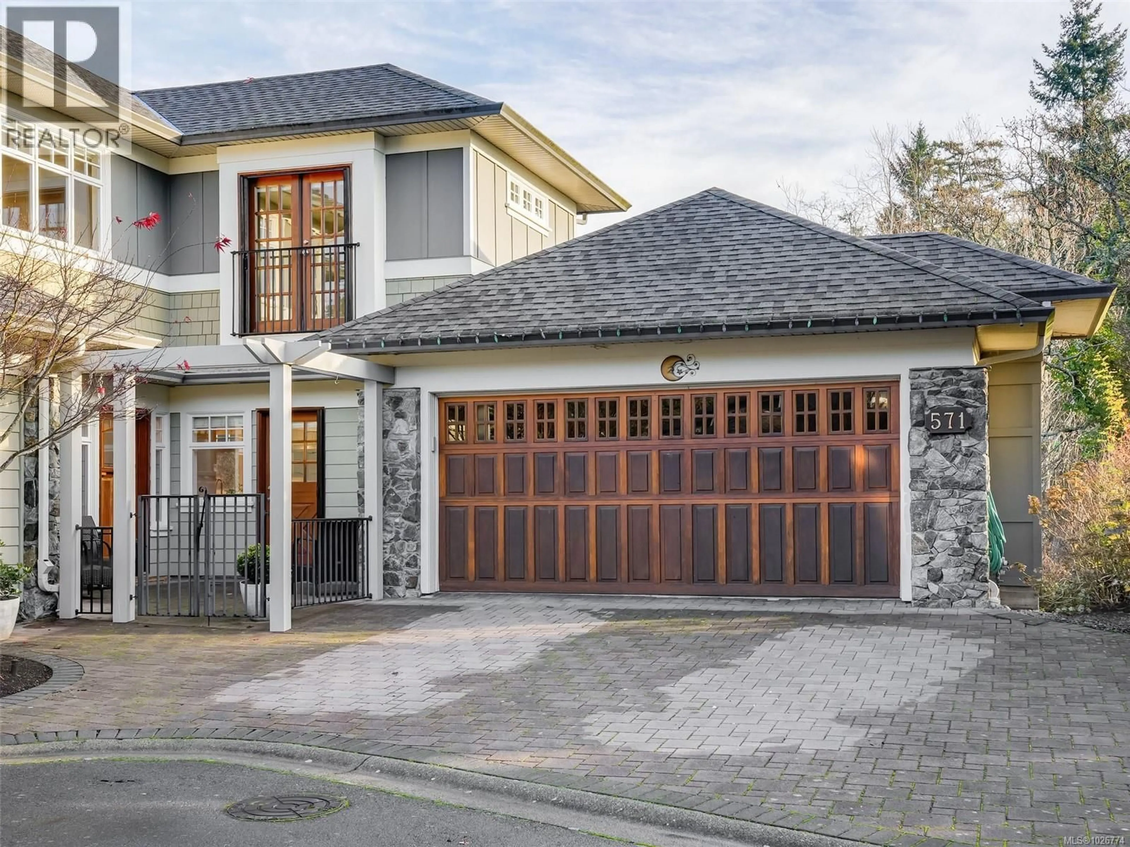 Home with brick exterior material, street for 571 CASELTON PLACE, Saanich British Columbia V8Z7Y5