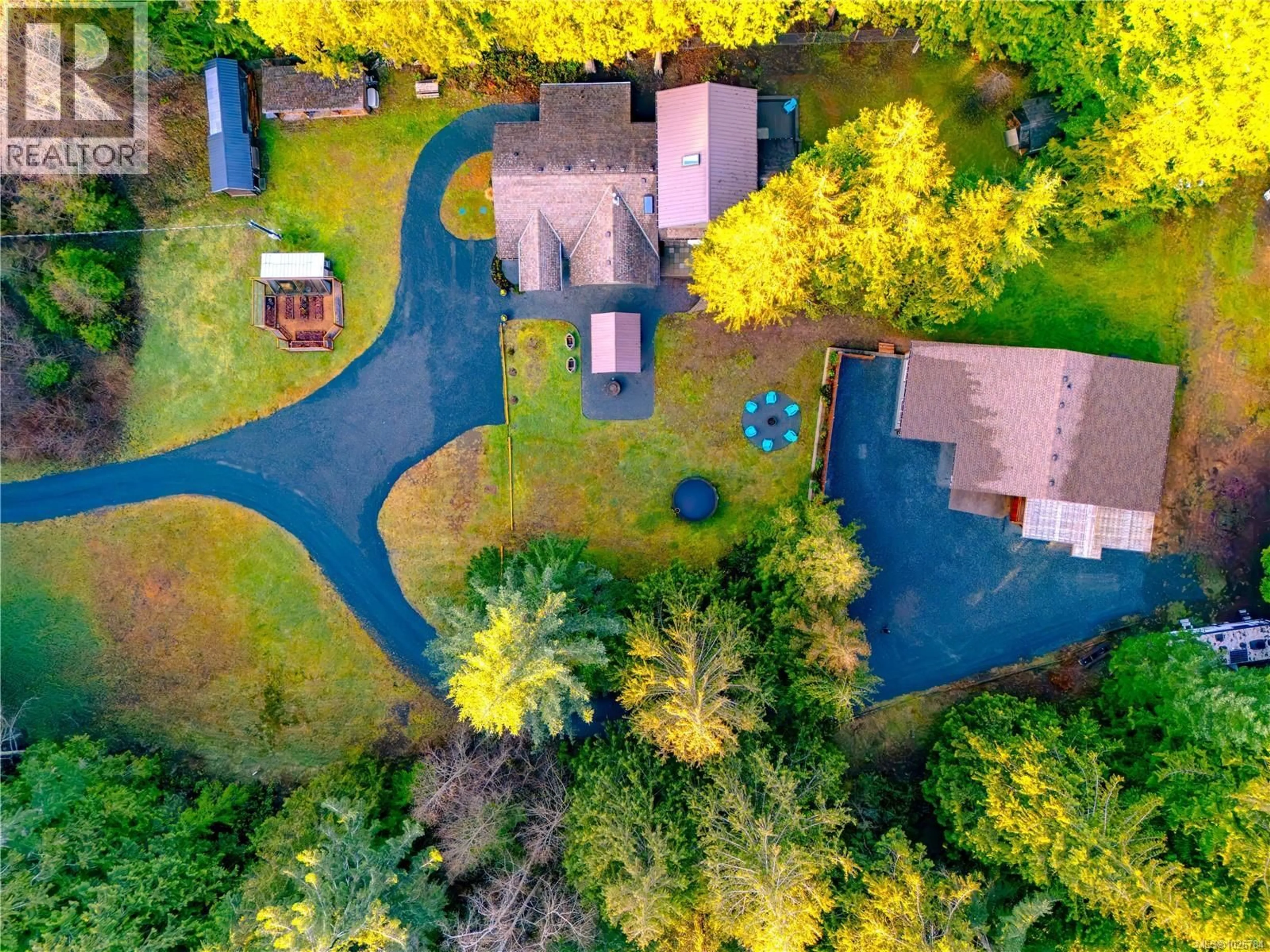 A pic from outside/outdoor area/front of a property/back of a property/a pic from drone, street for 375 BAYLIS ROAD, Qualicum Beach British Columbia V9K2A7