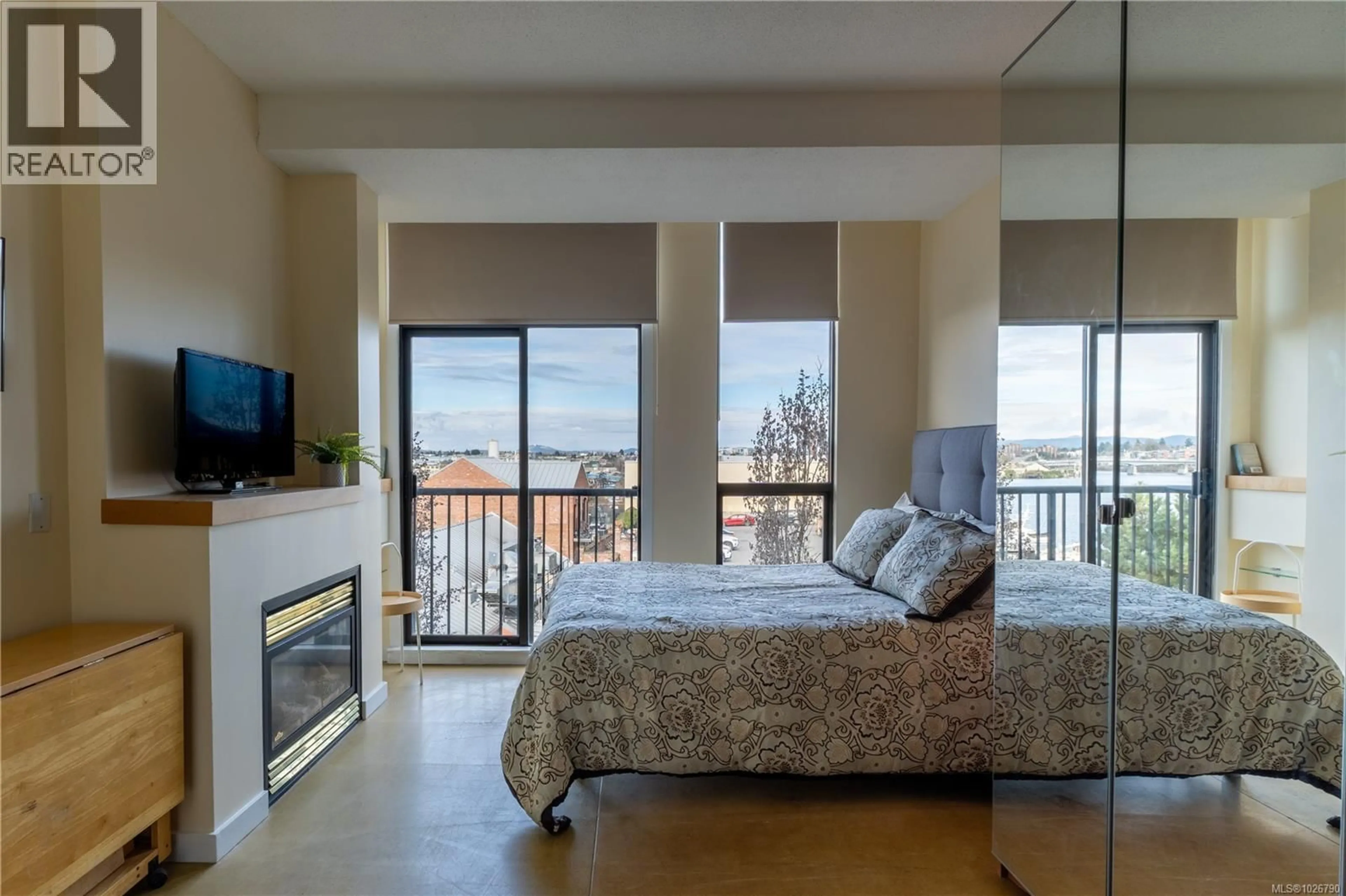 Bedroom with bed, wood/laminate floor for 419 - 409 SWIFT STREET, Victoria British Columbia V8W1S2