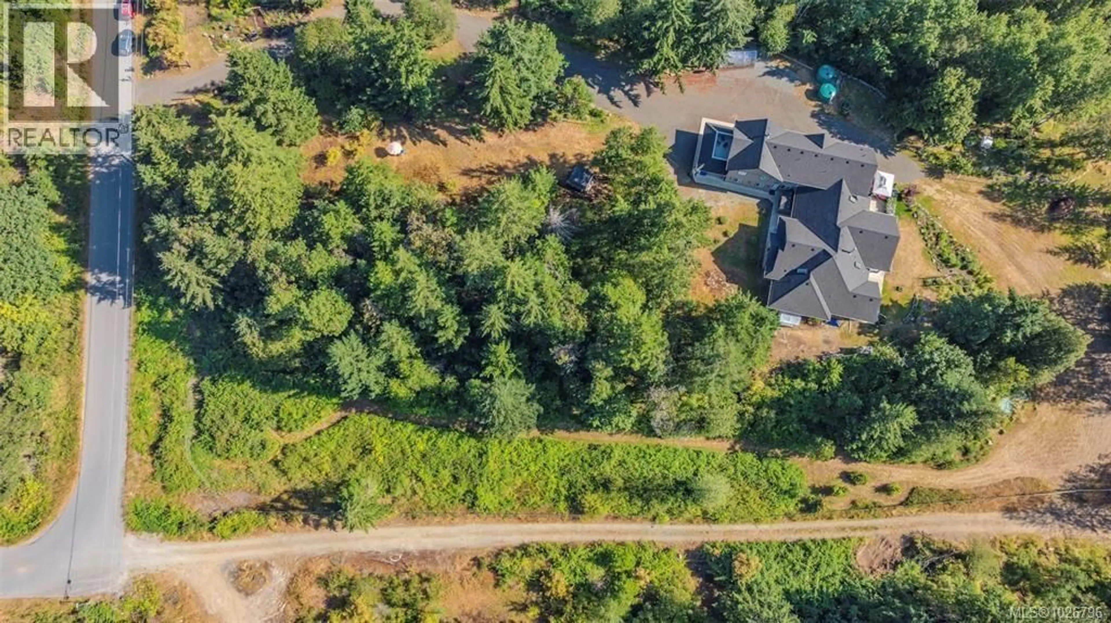 A pic from outside/outdoor area/front of a property/back of a property/a pic from drone, forest/trees view for 1390 KURTIS CRESCENT, Nanaimo British Columbia V9X1X3