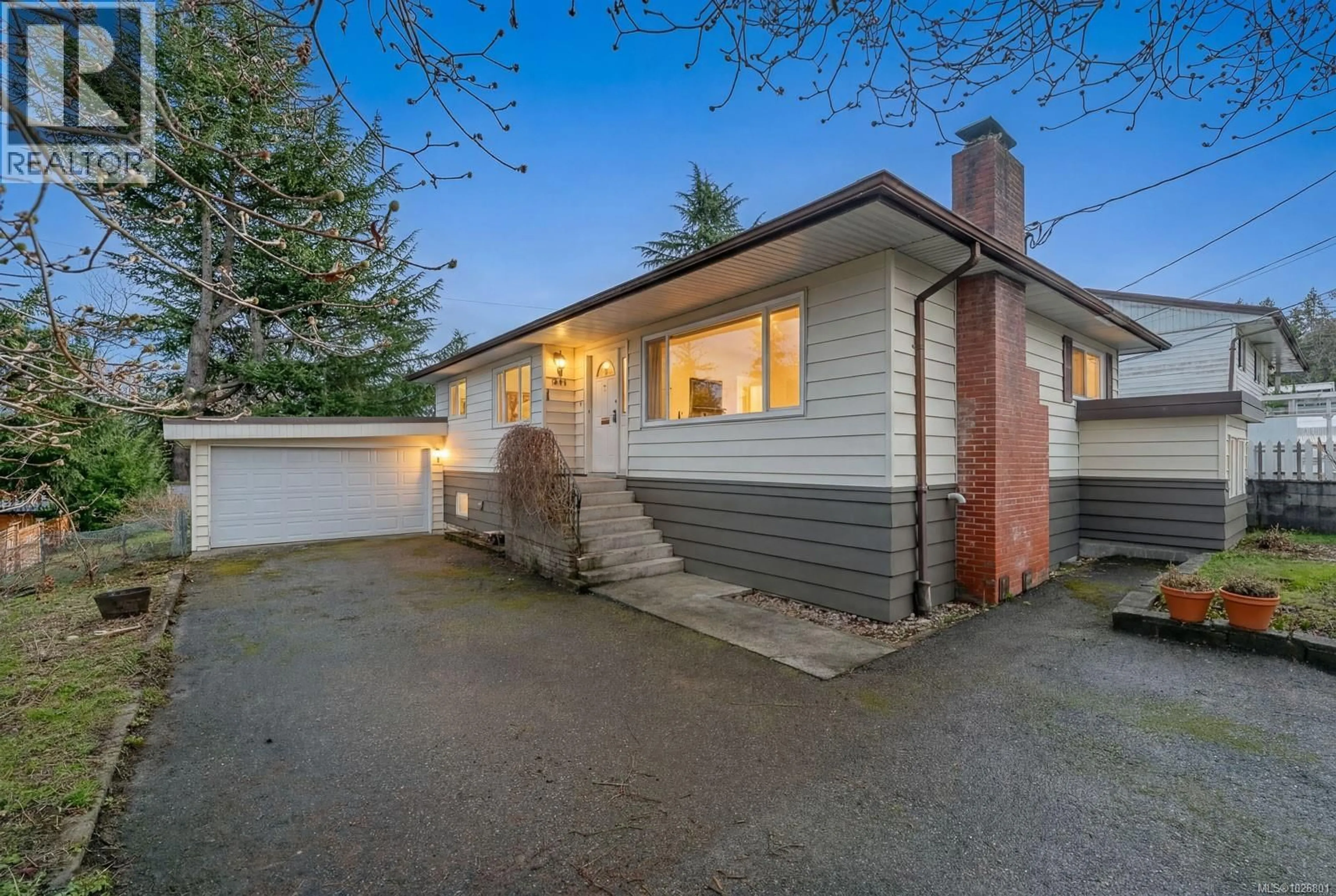 A pic from outside/outdoor area/front of a property/back of a property/a pic from drone, street for 1986 QUADRA AVENUE, Nanaimo British Columbia V9S3A1