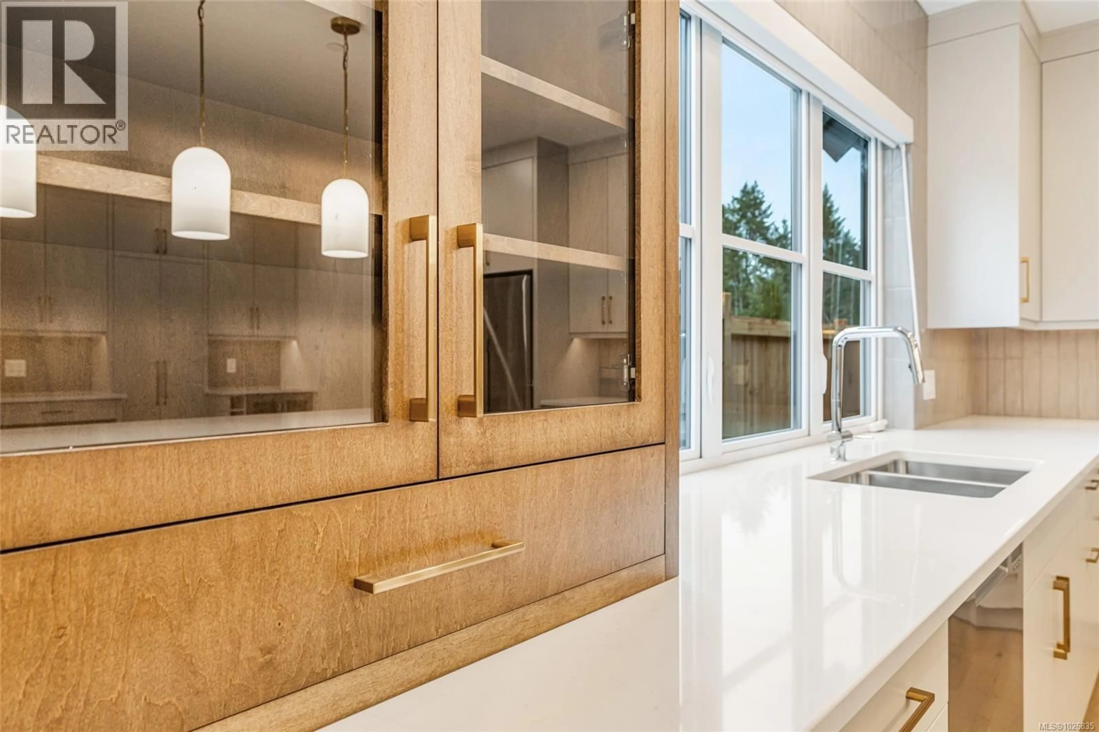 Contemporary kitchen, ceramic/tile floor for 513 HOLE-IN-ONE DRIVE, Qualicum Beach British Columbia V9K0B9