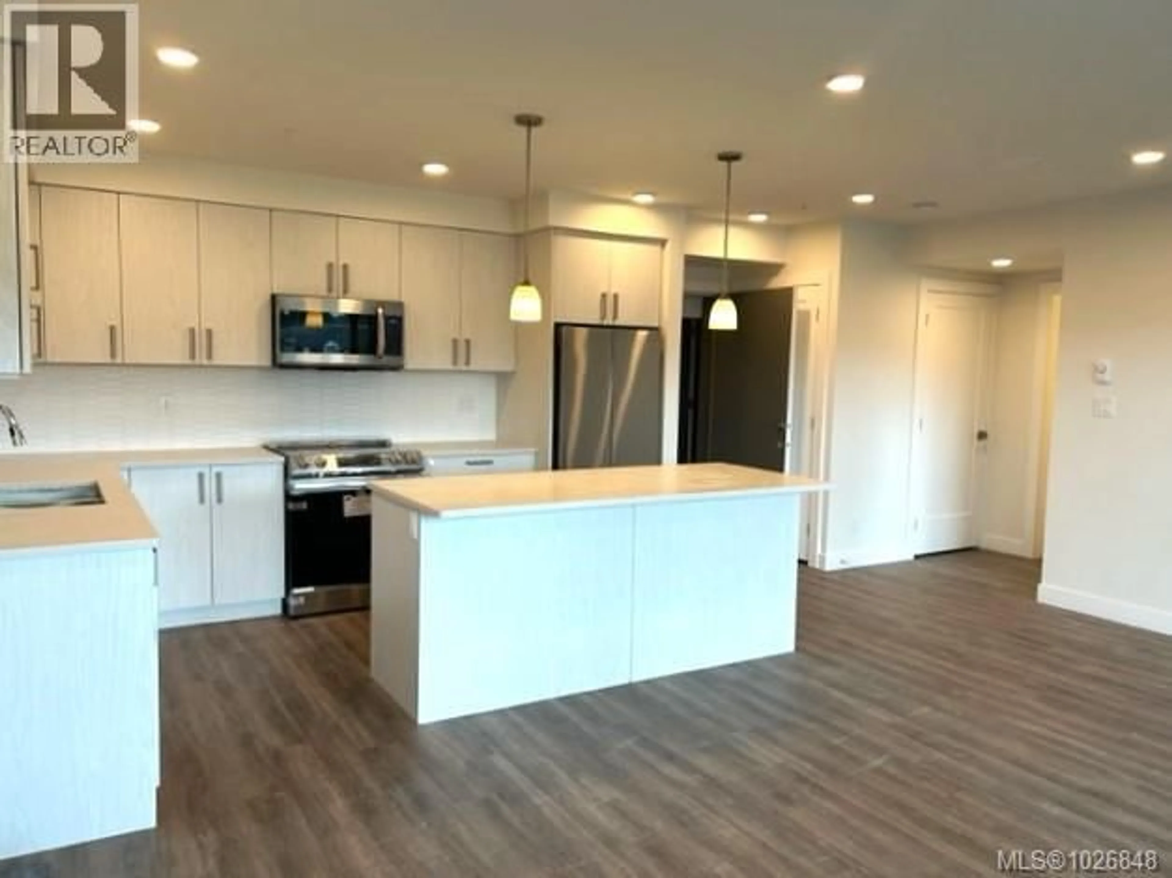 Open concept kitchen, unknown for 502 - 147 HALIBURTON STREET, Nanaimo British Columbia V9R4V9