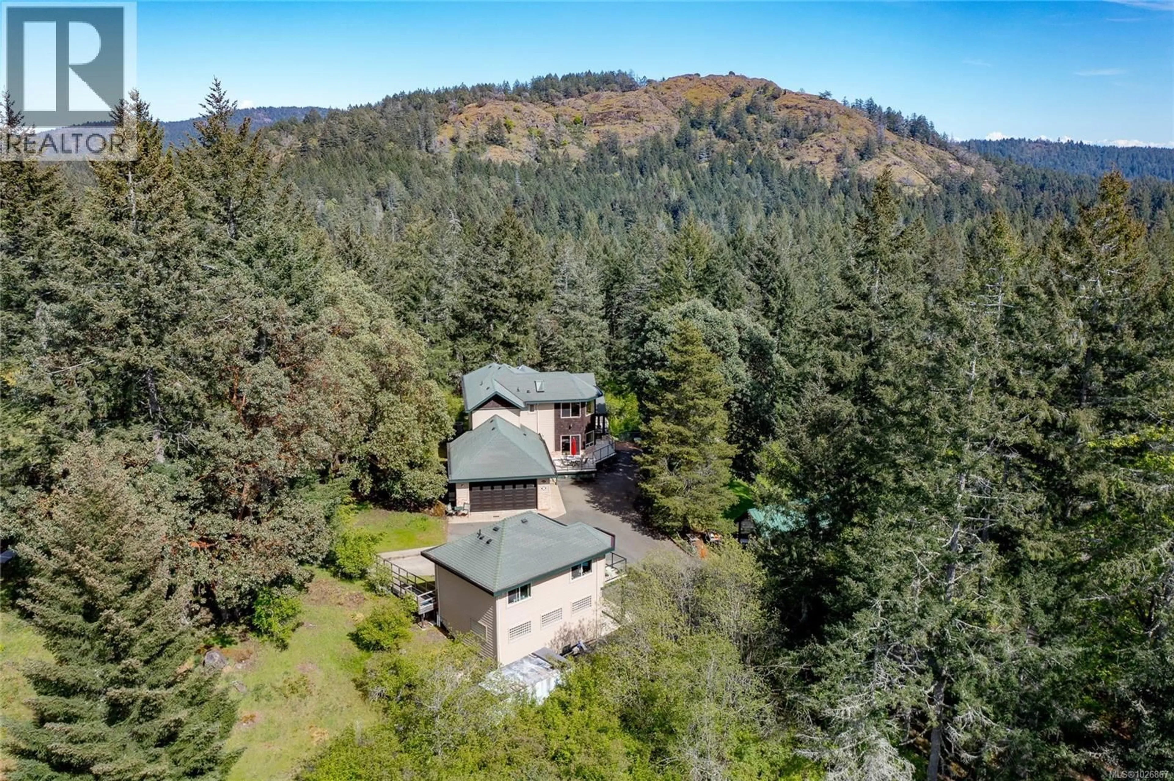 A pic from outside/outdoor area/front of a property/back of a property/a pic from drone, forest/trees view for 1450 WHITE PINE TERRACE, Highlands British Columbia V9B6J3