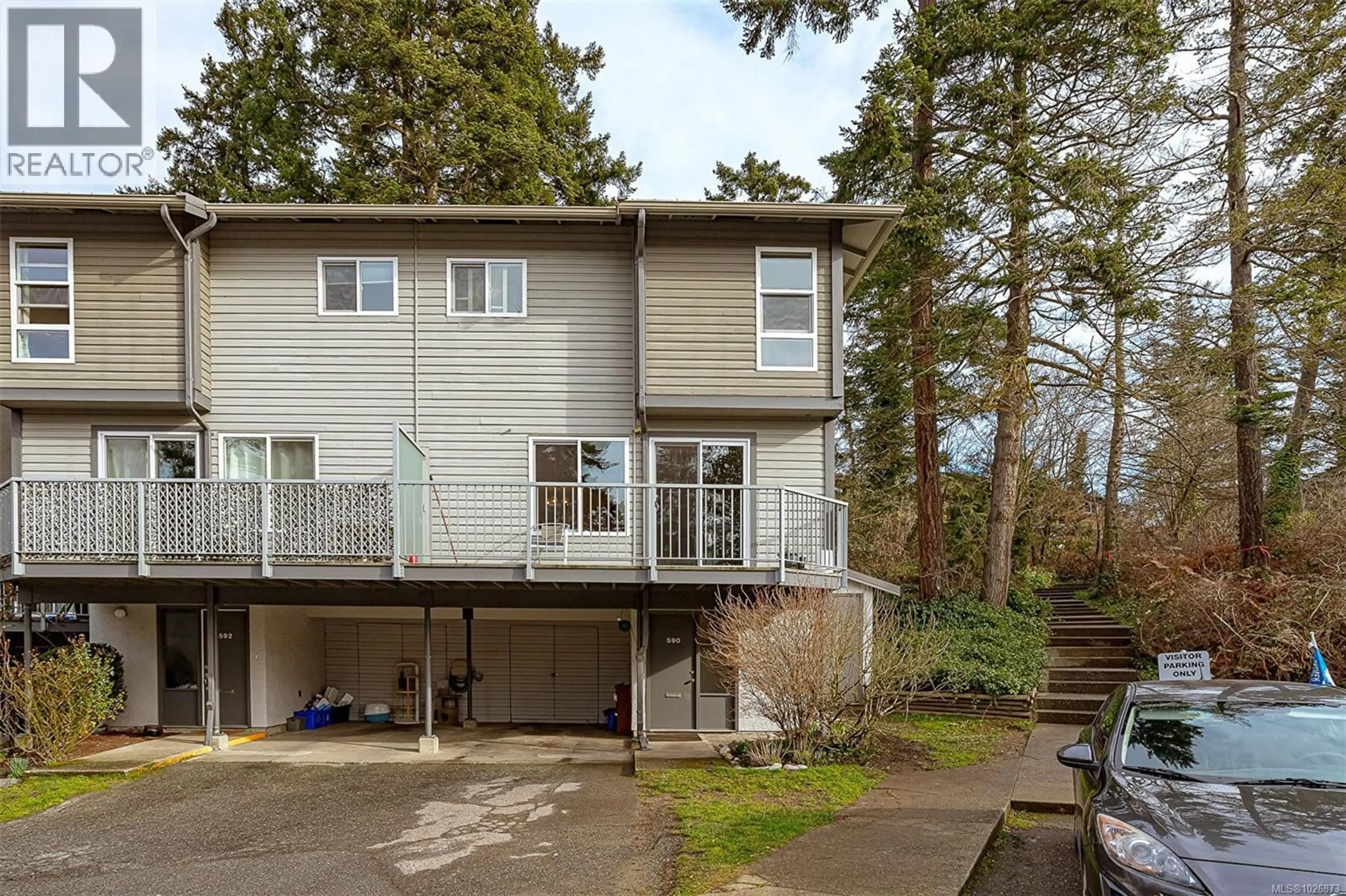 Home with vinyl exterior material, street for 590 CARNATION PLACE, Saanich British Columbia V8Z6G5