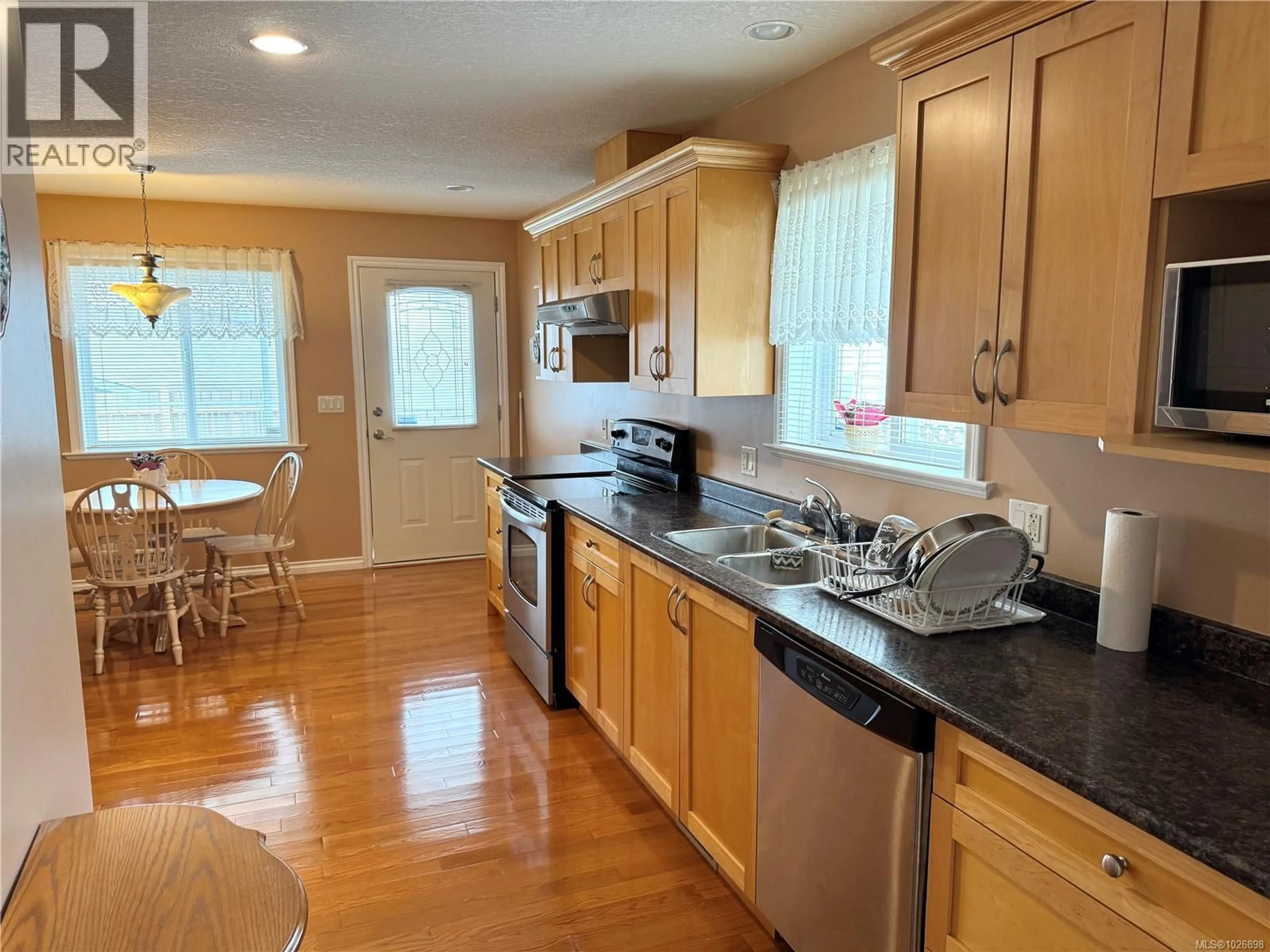 Standard kitchen, wood/laminate floor for 3734 12TH AVENUE, Port Alberni British Columbia V9Y5A5