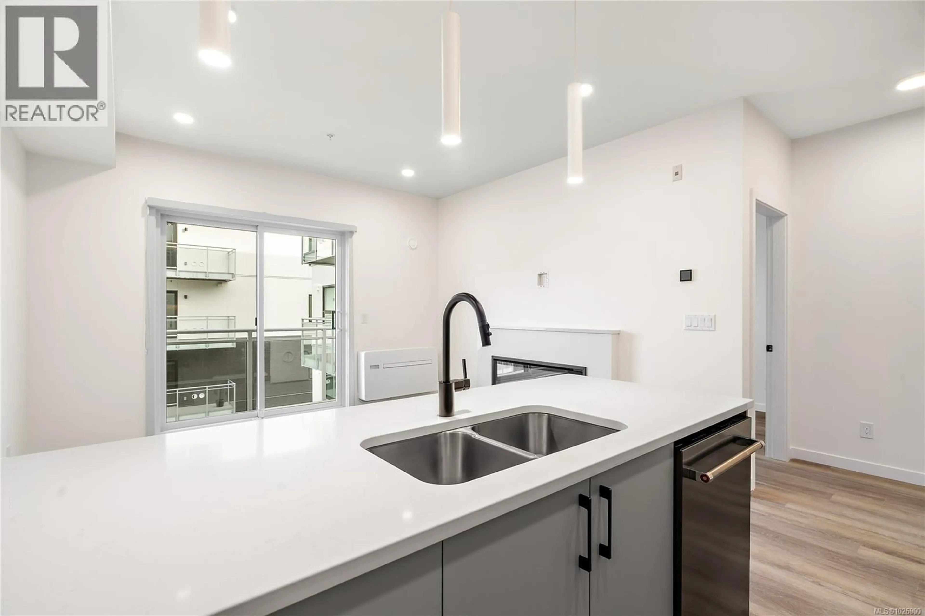 Open concept kitchen, unknown for 302 - 1102 ESQUIMALT ROAD, Esquimalt British Columbia V9A0L3
