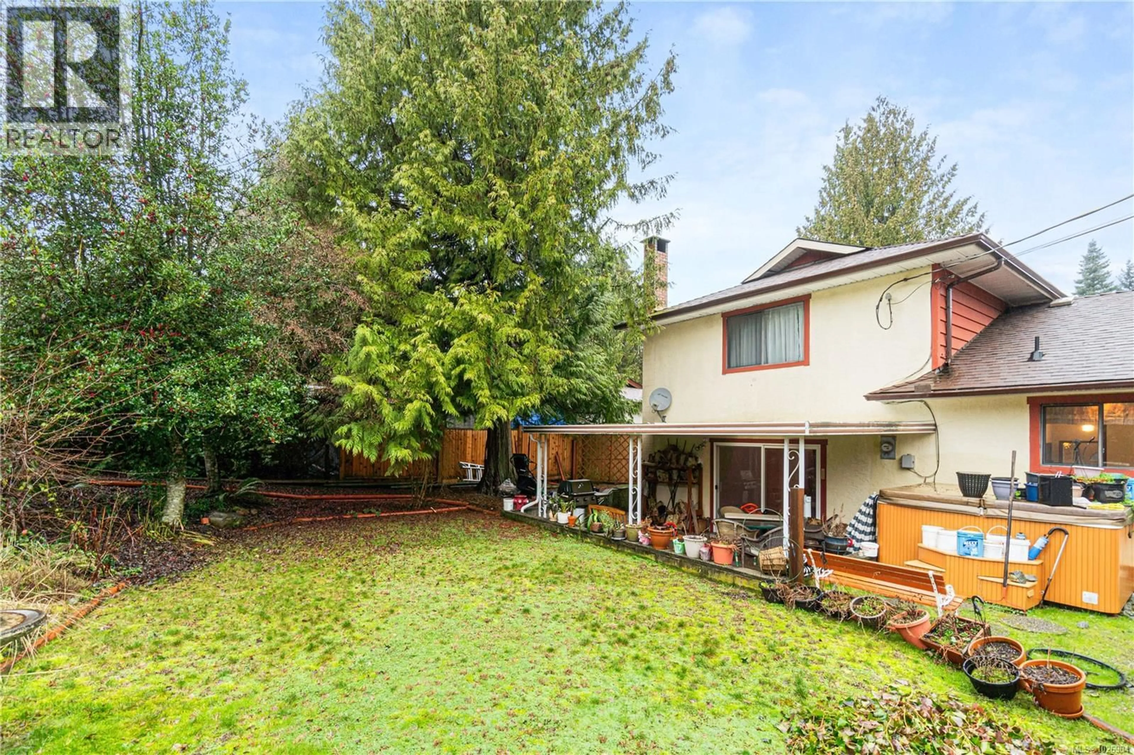 A pic from outside/outdoor area/front of a property/back of a property/a pic from drone, unknown for 666 TAMARACK DRIVE, Qualicum Beach British Columbia V9K1A8